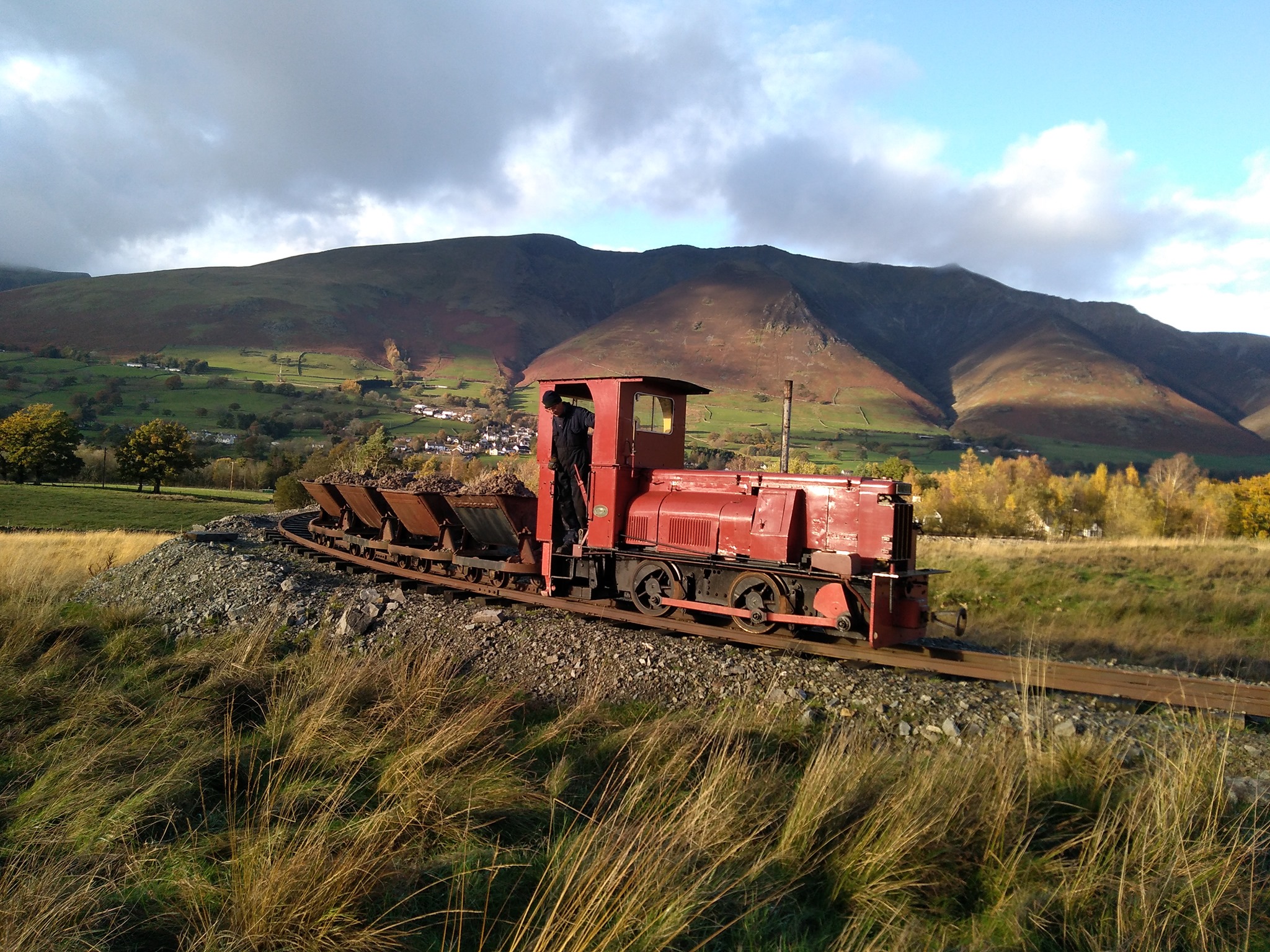 The image shows a replica train carrying coal into, or out of, the mines.