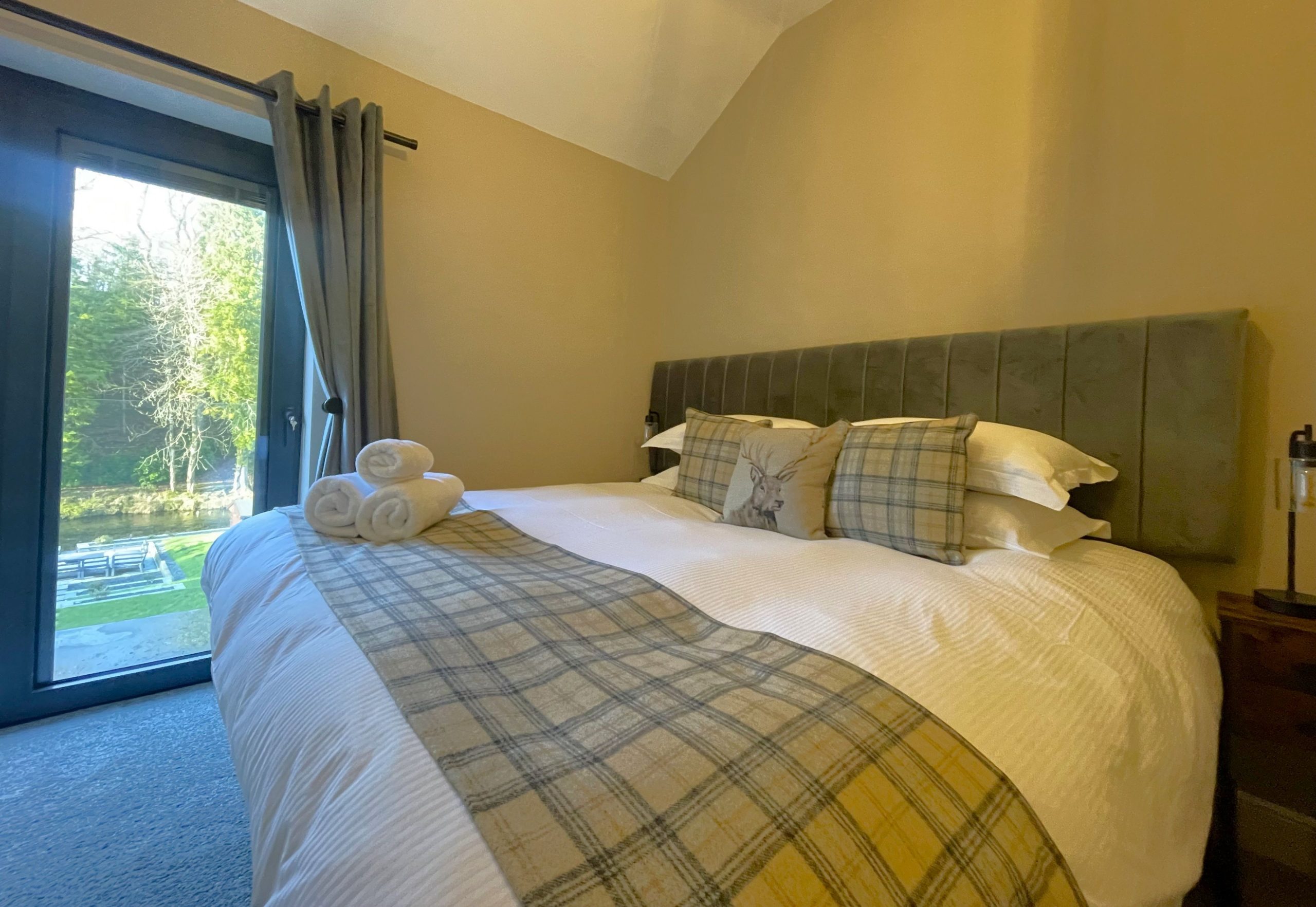 beautiful views over the garden and River Greta, which are on full display thanks to the floor-ceiling casement window