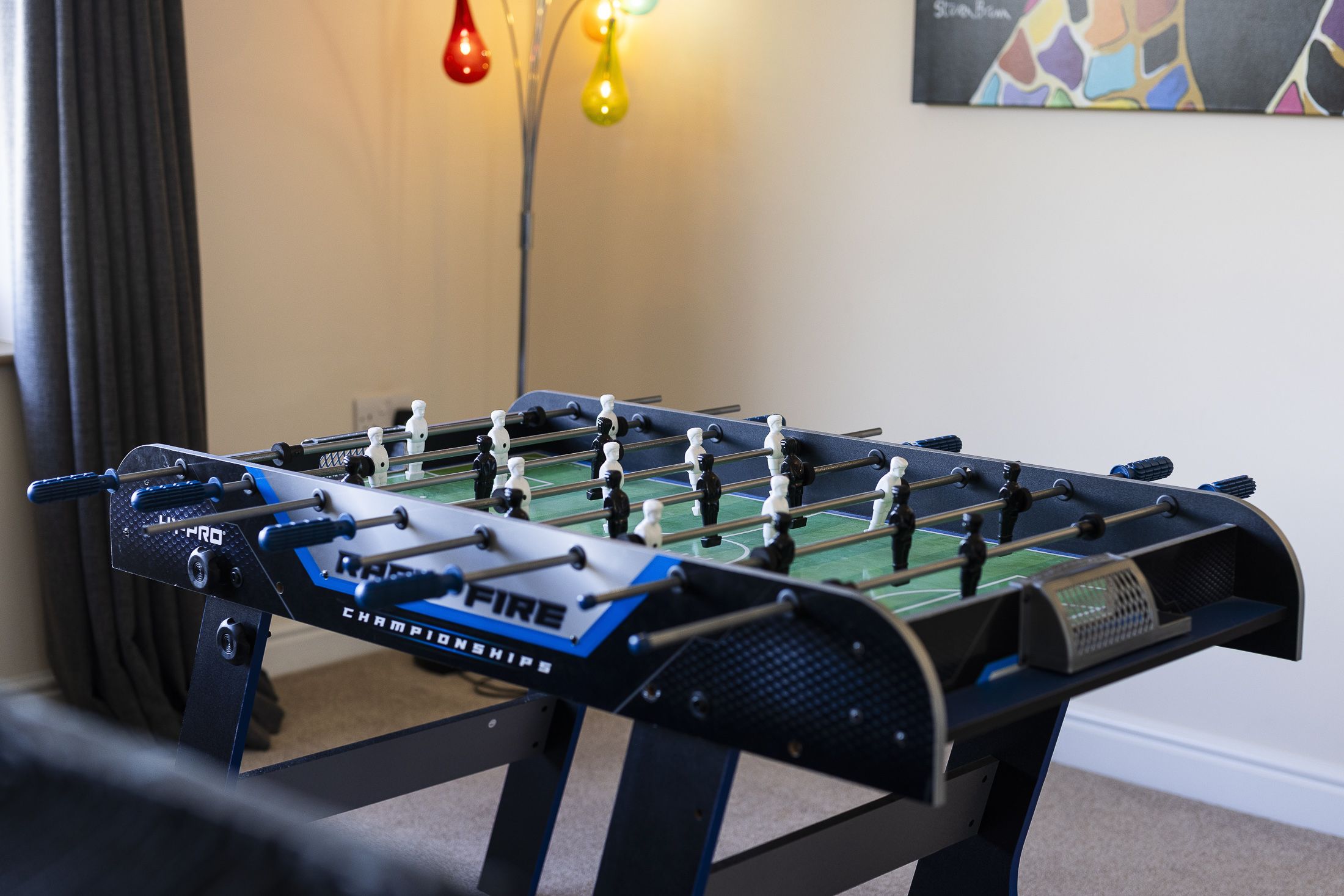 Get competitive with a game of Foosball!