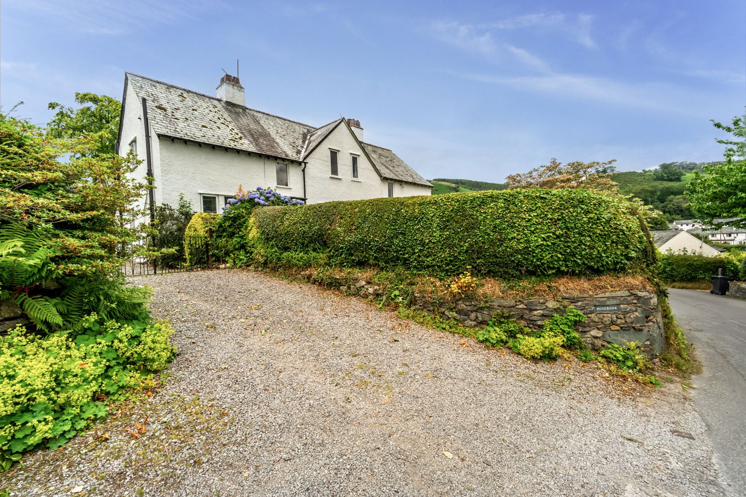 The private driveway is big enough for 2 small cars