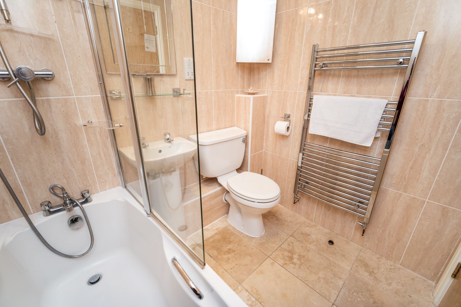 The bathroom is suited to families with young children