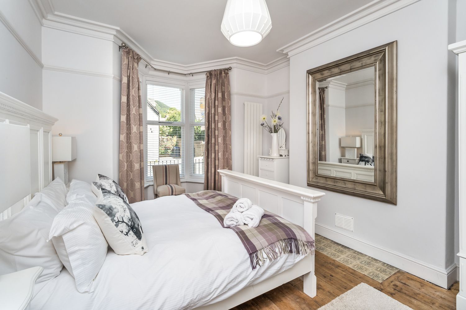 The master bedroom is found on the ground floor of the property