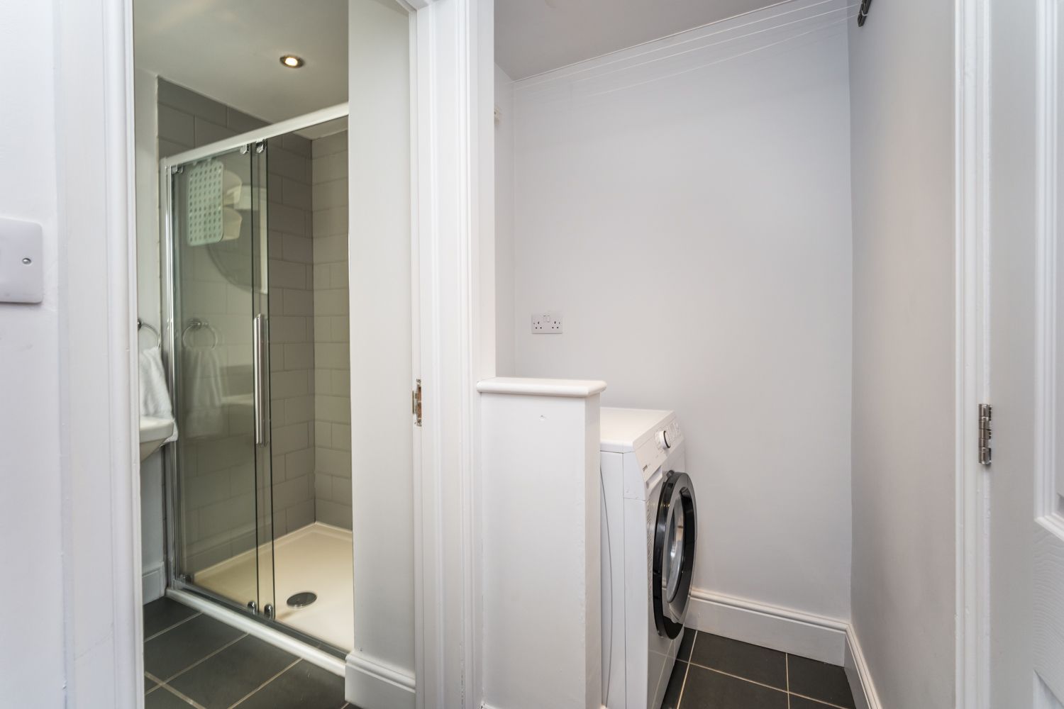 The washer/drier is found in the rear hallway