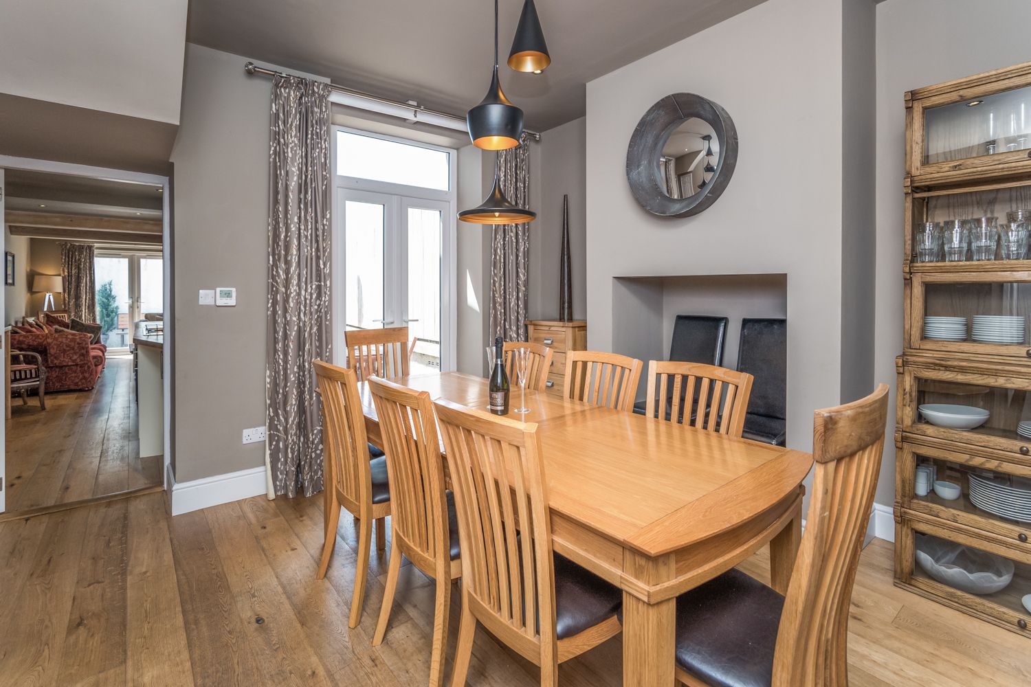 You can access the rear yard from the dining area