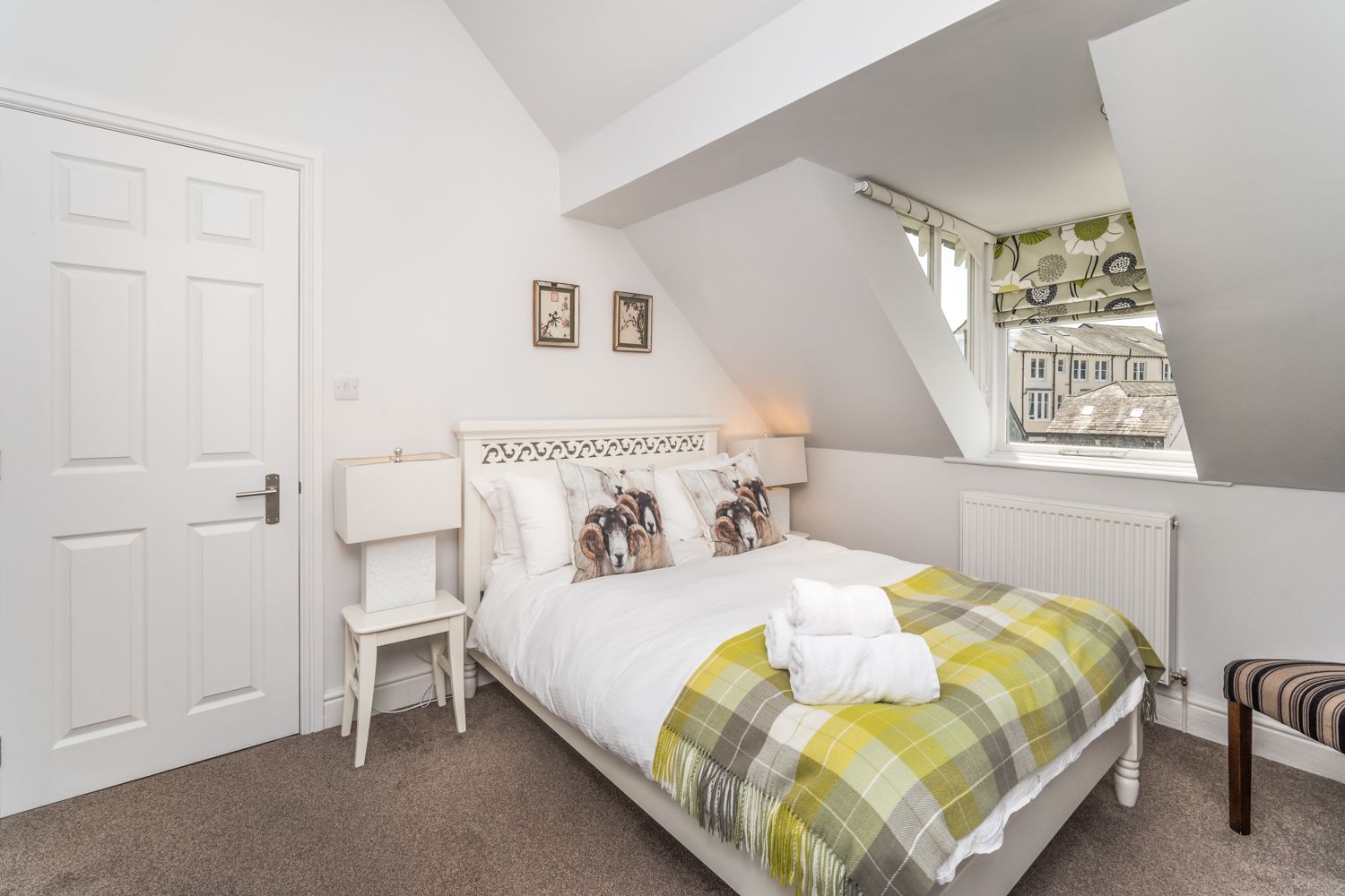 The fourth bedroom on the 2nd floor has a double bed, chest of drawers and bedside tables