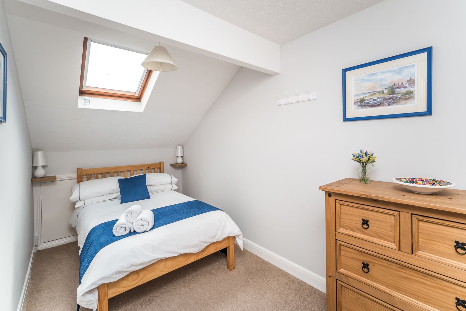 The second bedroom is on the 2nd floor and features a small double bed