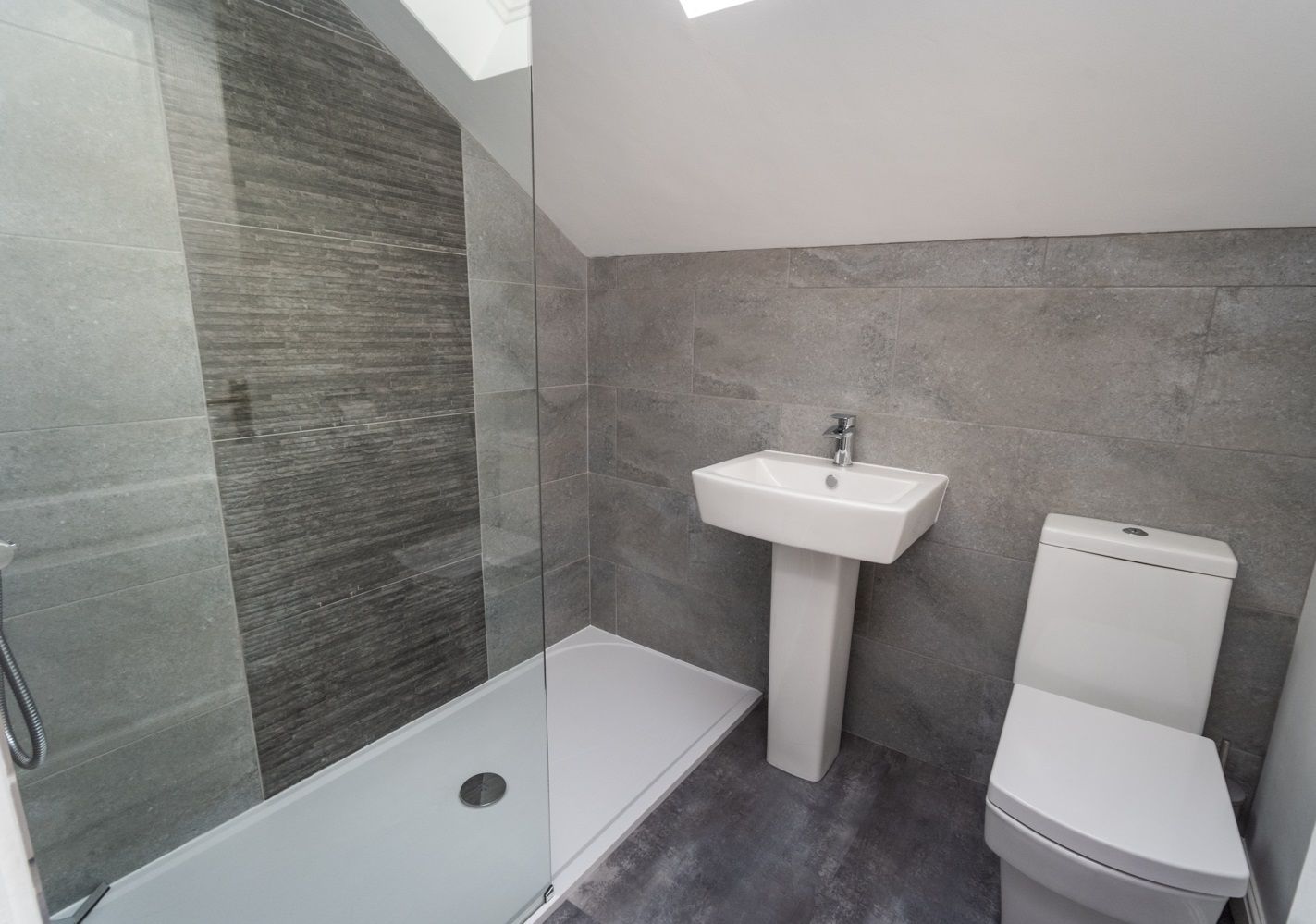 A beautiful modern bathroom can be found on the second floor
