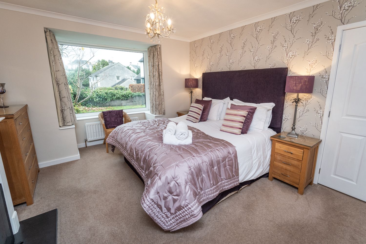 The ground floor bedroom is very spacious and has ample space for luggage