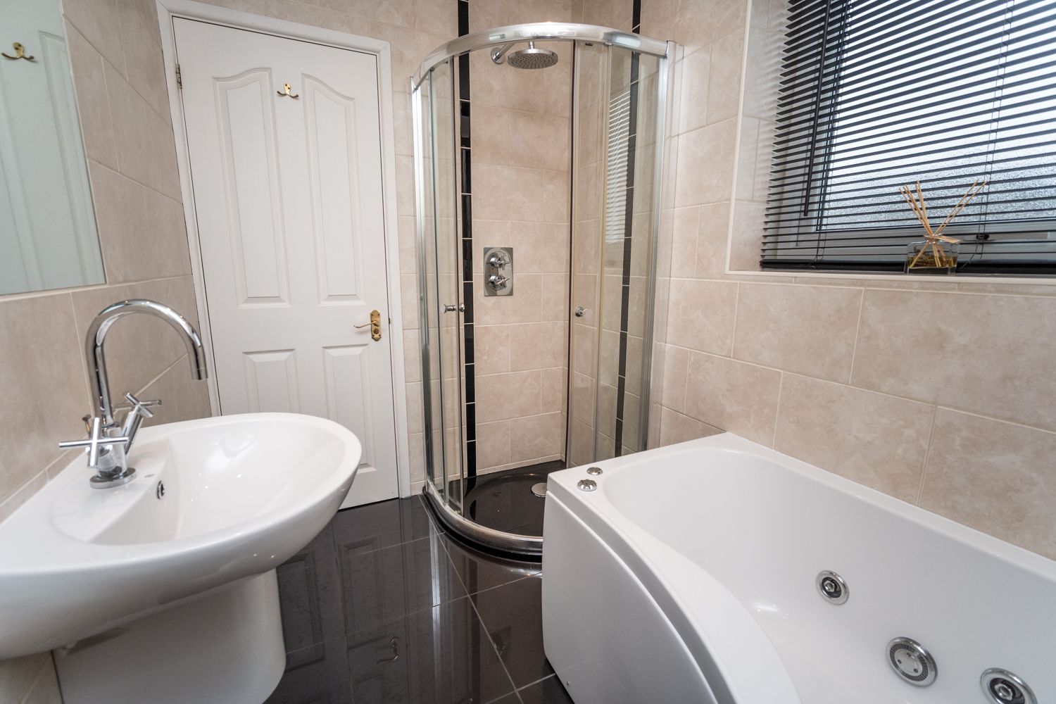 The bathroom is spacious and well lit