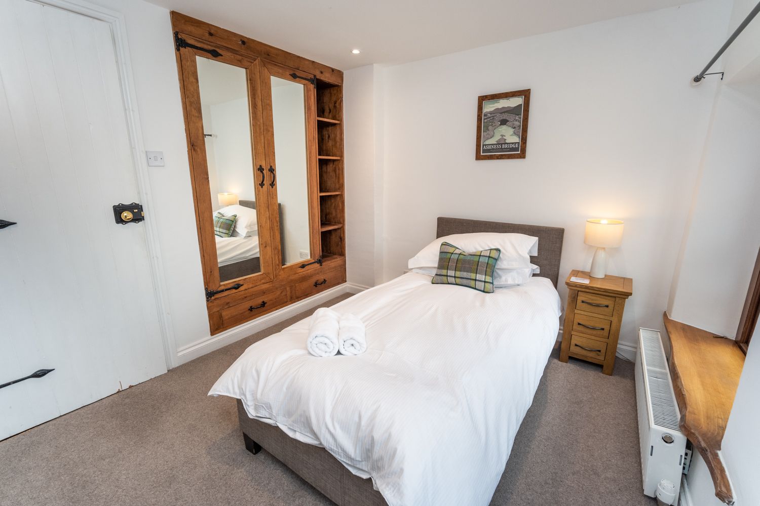 The single bedroom can be found on the 1st floor of the cottage