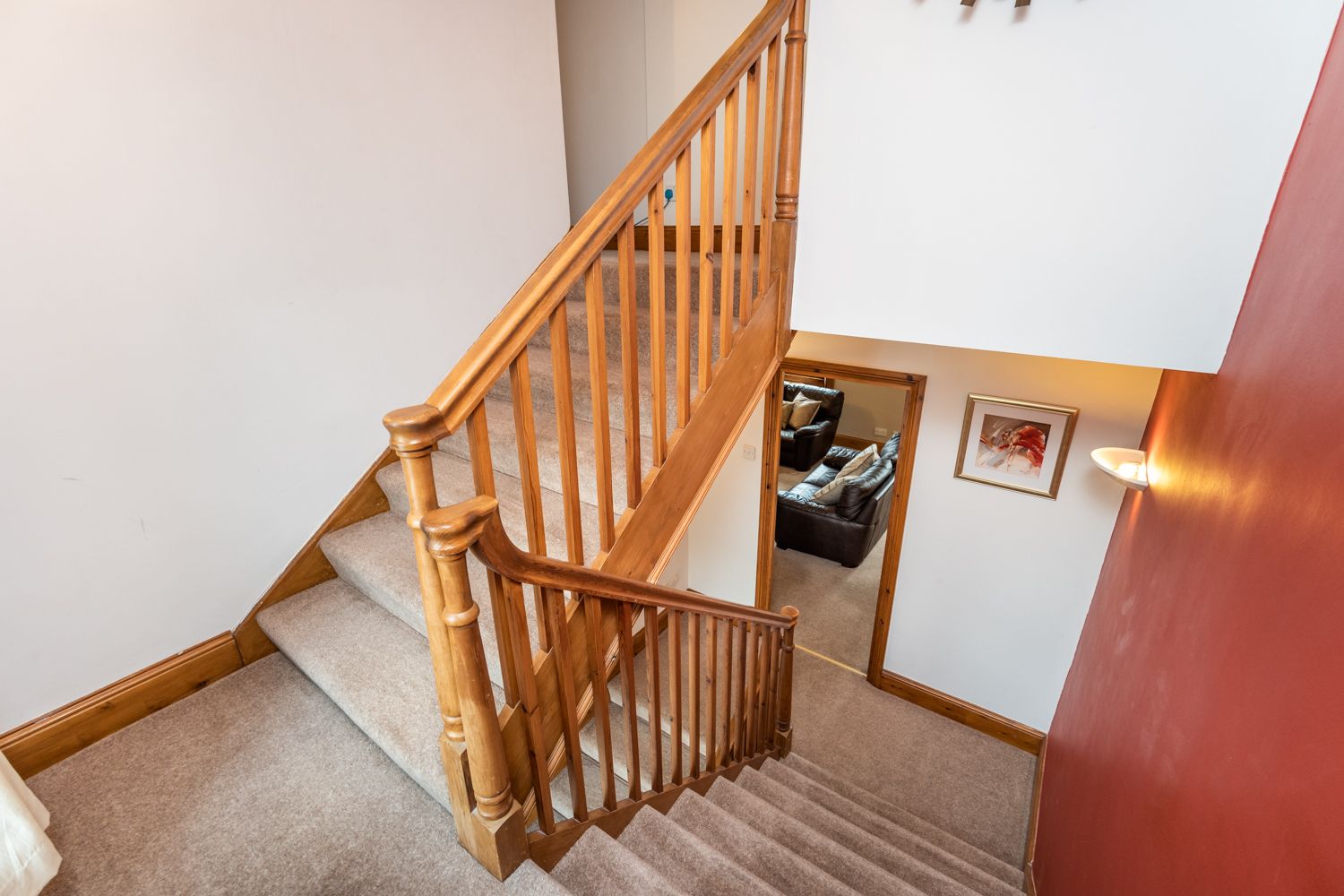 The property is laid out over 3 floors