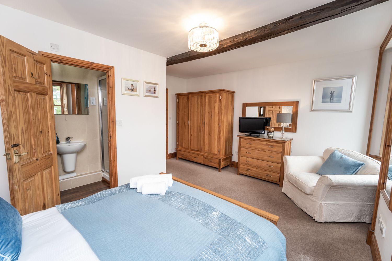 The bedroom also features a TV so you can catch up on your shows in bed!