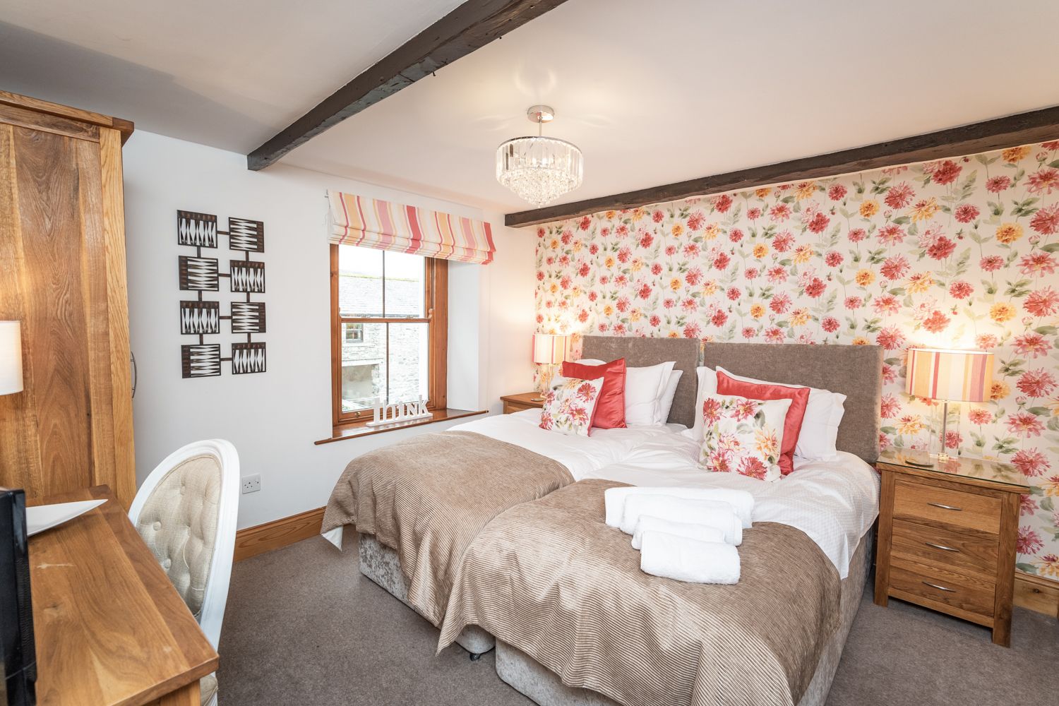 The third bedroom has 2 single beds, which can be made into a super-king for an extra charge