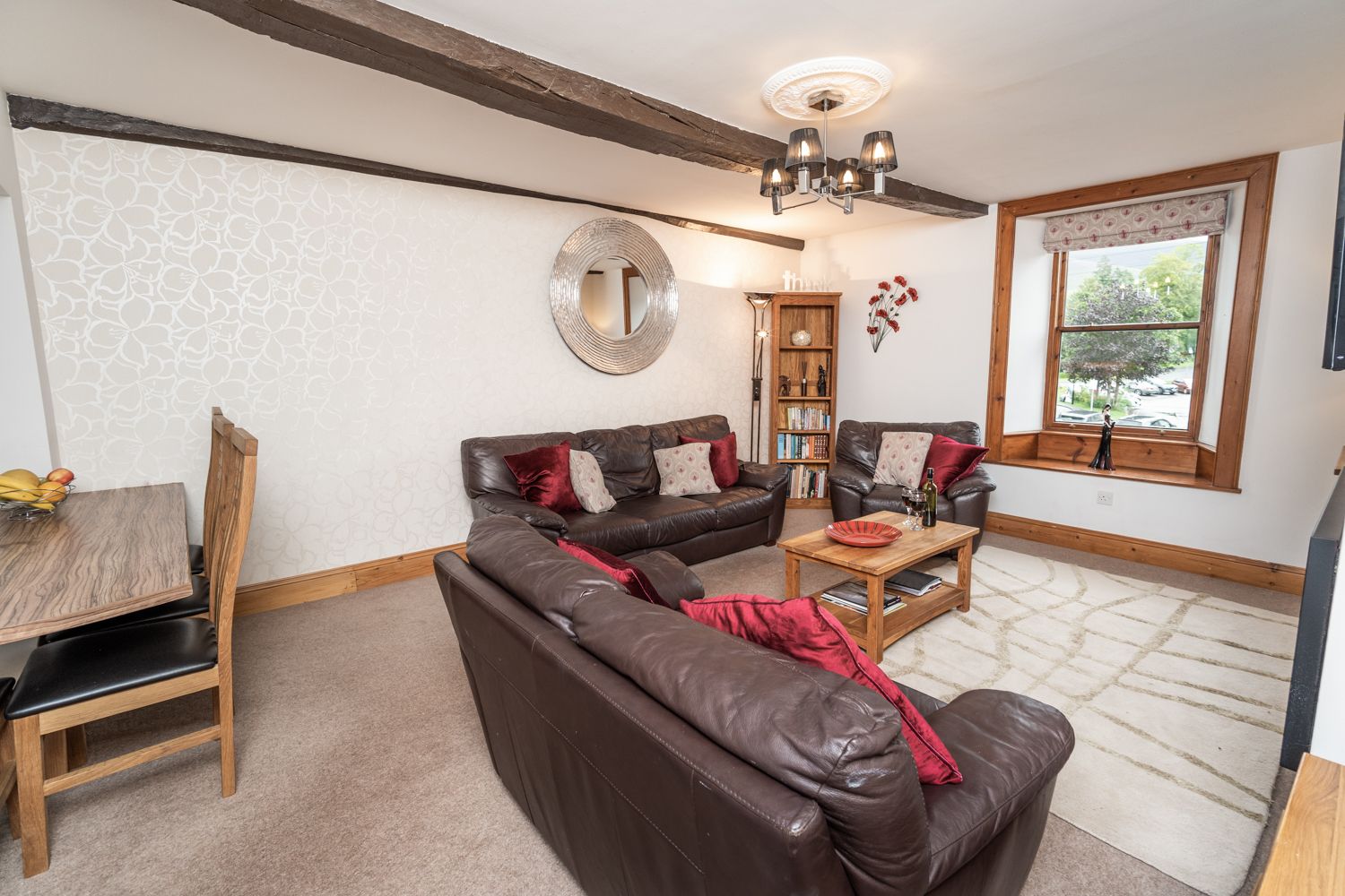 The large open plan living, dining and kitchen area is very spacious and has plenty of seating for everyone to relax