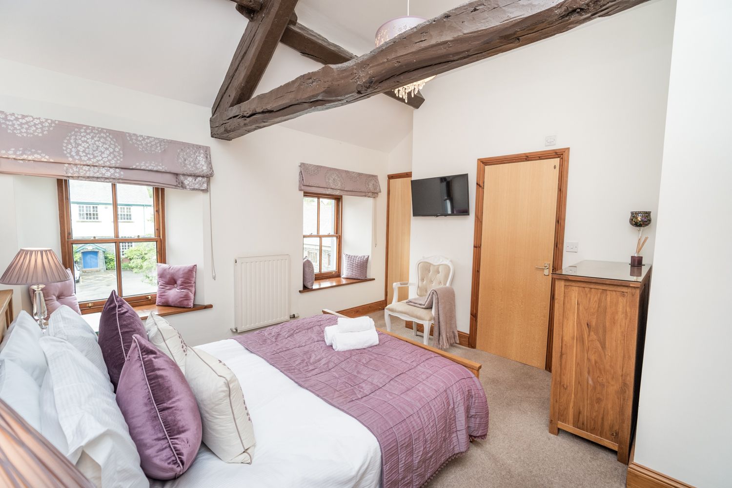 You can watch movies and shows in bed on the wall mounted TV 