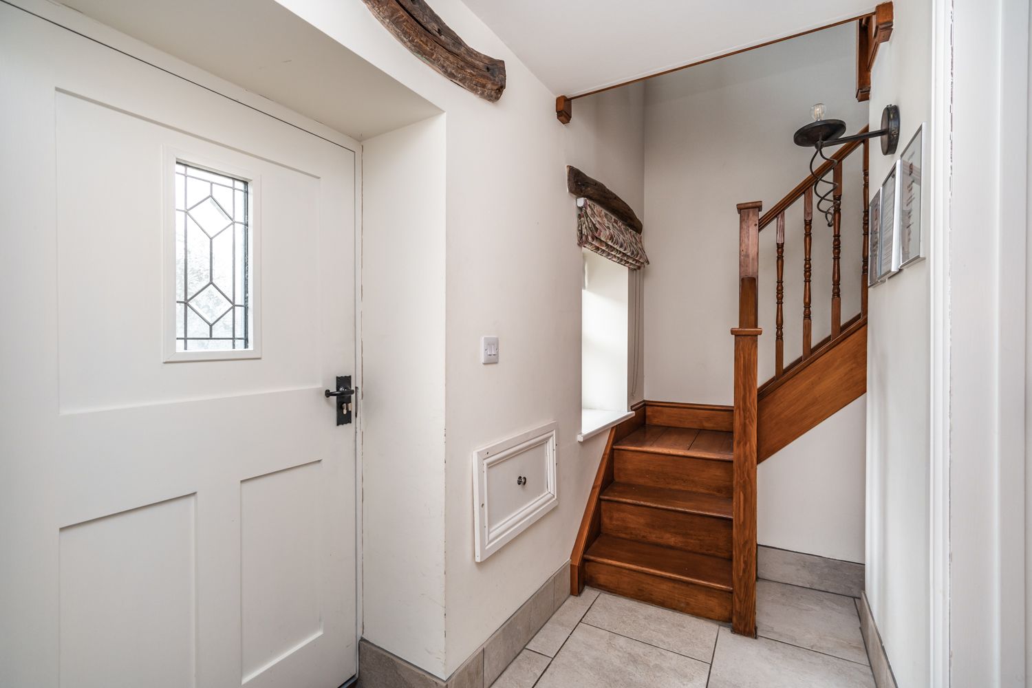 The hallway is spacious enough to leave boots and umbrellas