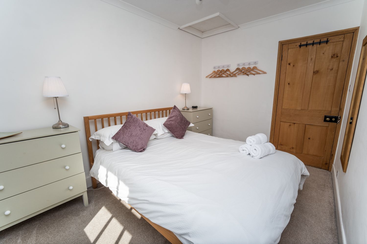 The master bedroom has drawers and space to hang clothes 