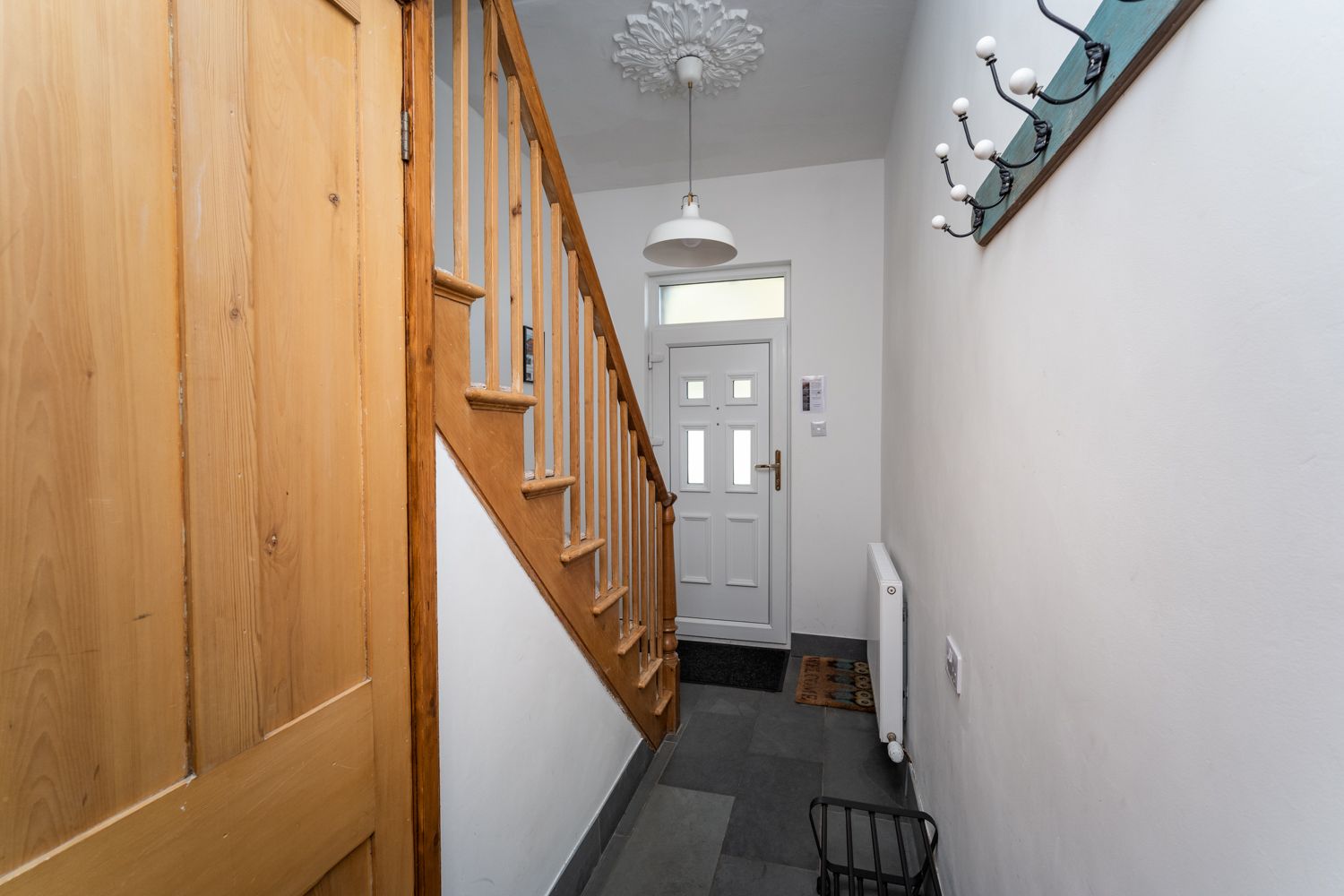 The entrance hall has plenty of space for muddy boots and coats 
