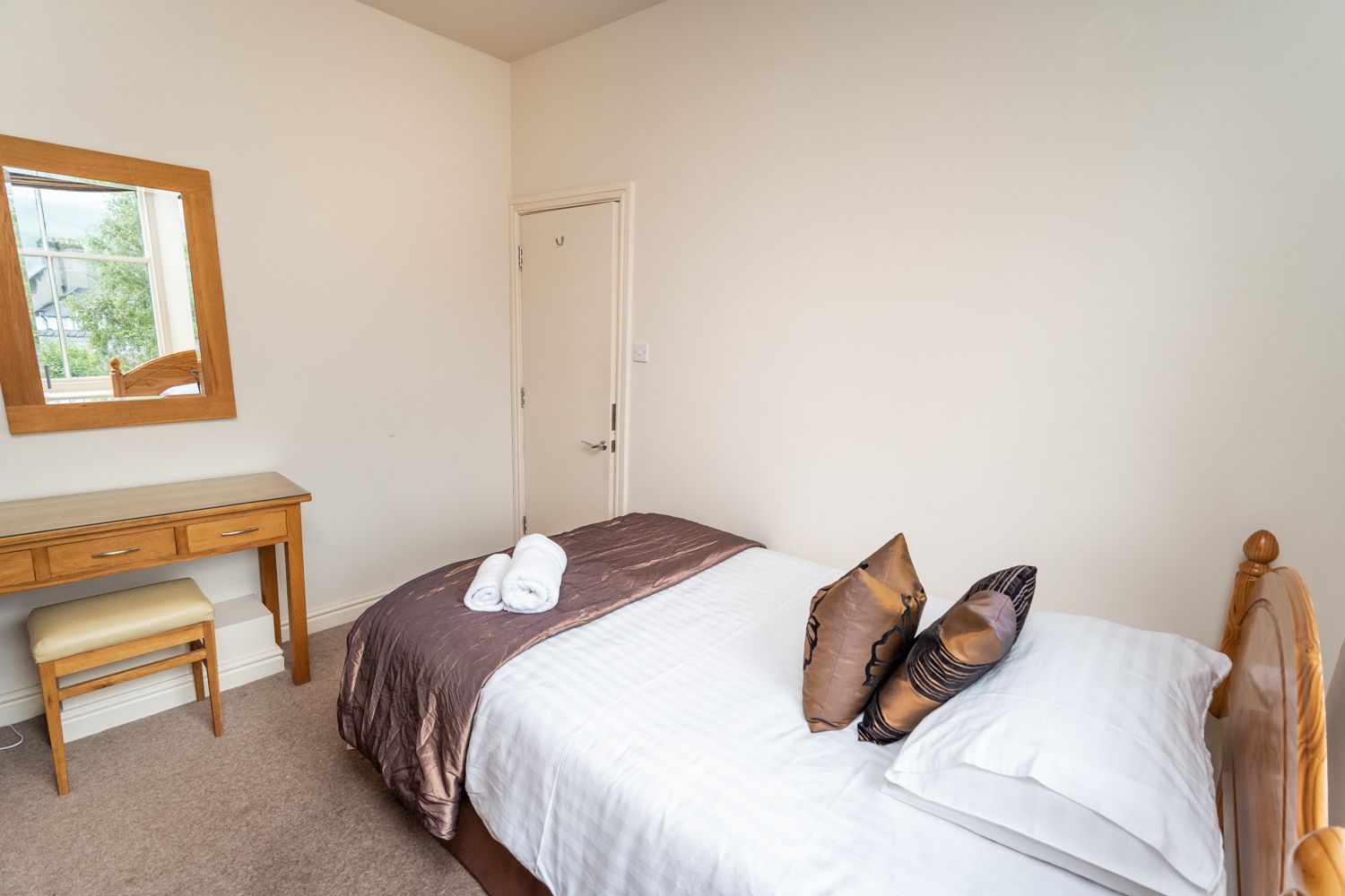 Towels and luxury bed linen are provided