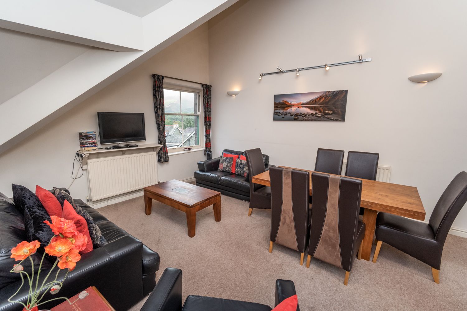 The living and dining area is spacious and has excellent views towards Walla Crag