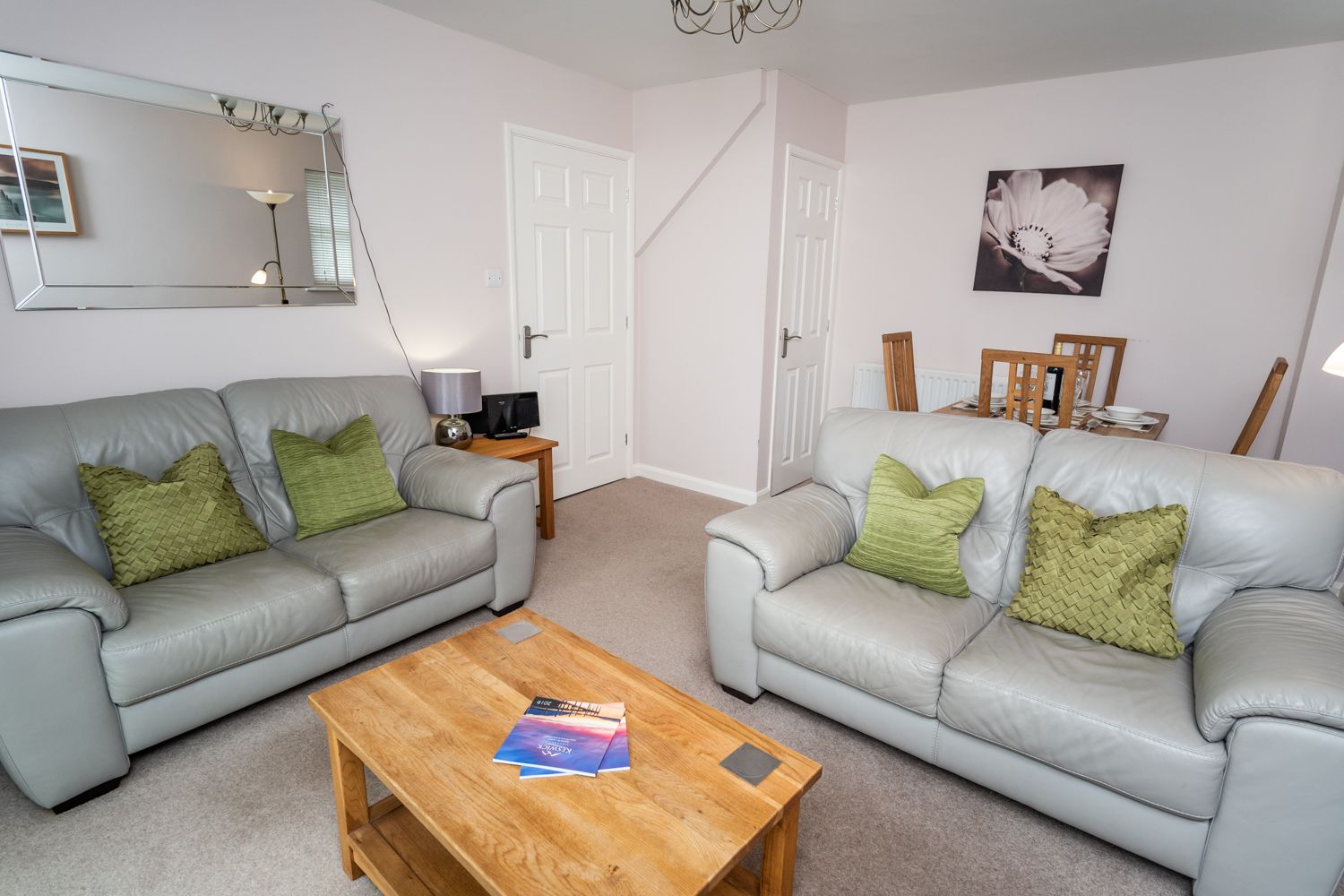The two bedroomed property can accommodate up to 4 people, and also benefits from a private parking space