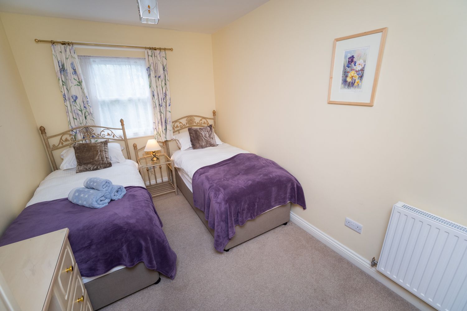 This light and peaceful room has plenty of space and storage for luggage