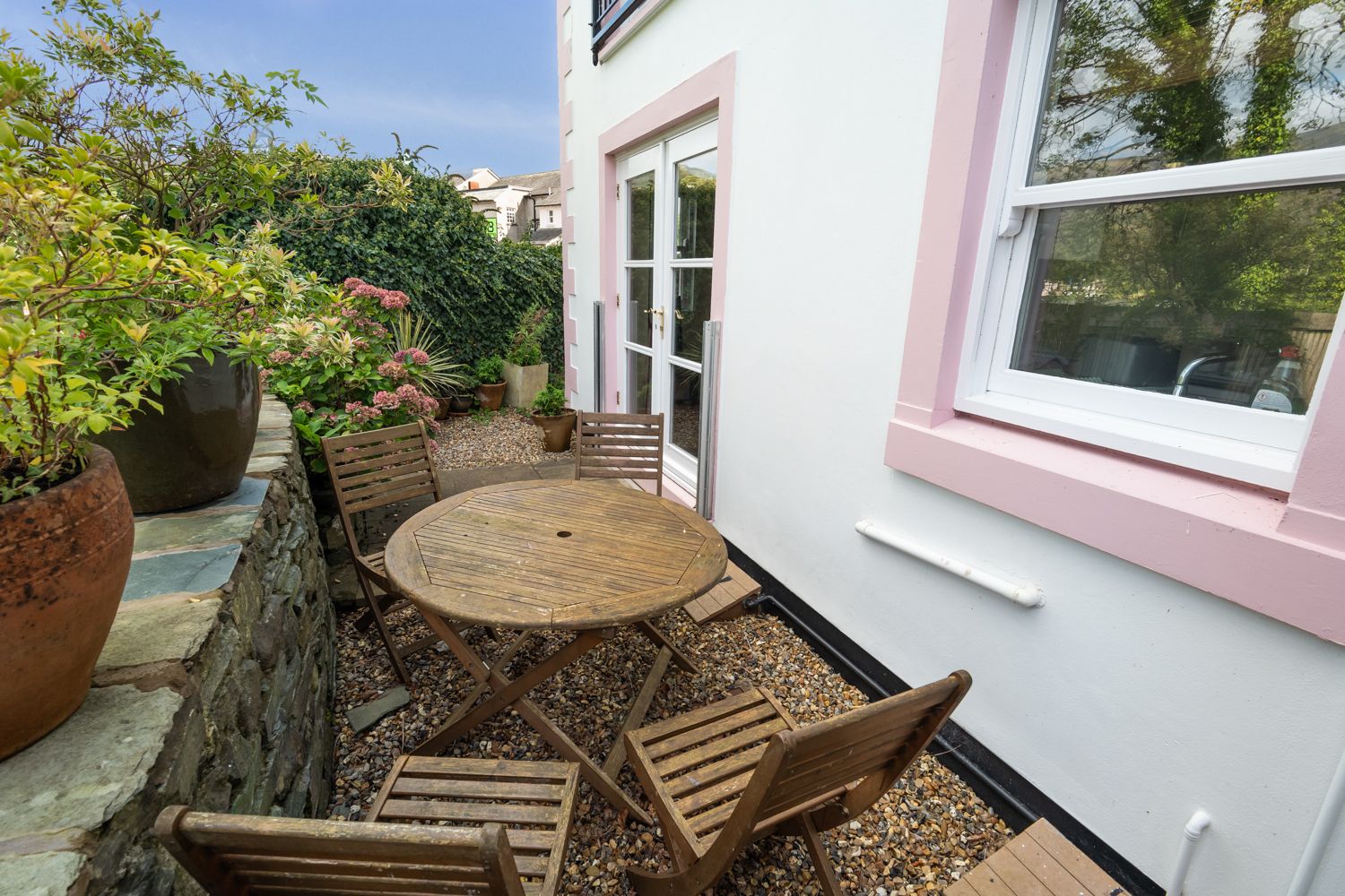 Enclosed patio with wonderful views of the riverbank and fells