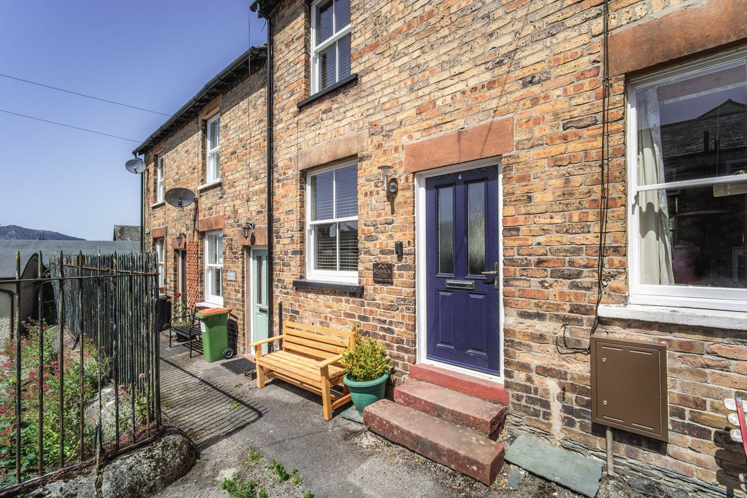 A pretty cottage in the heart of Keswick, set back from the road with private parking for 1 car