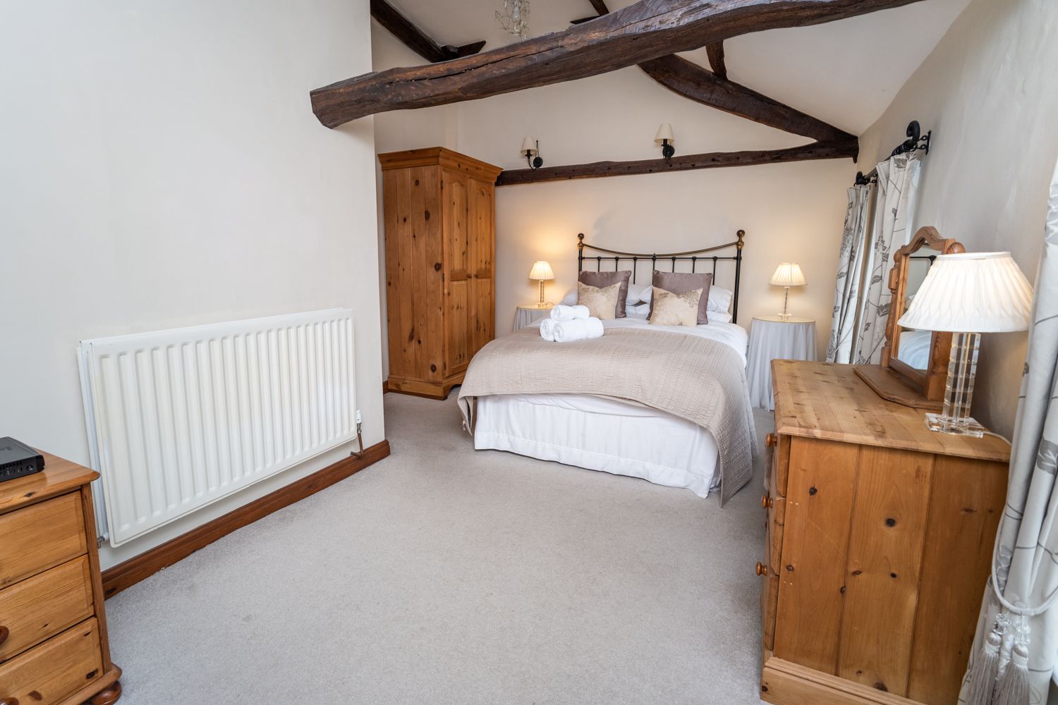 A spacious and airy master bedroom to relax in after a day adventuring in Keswick