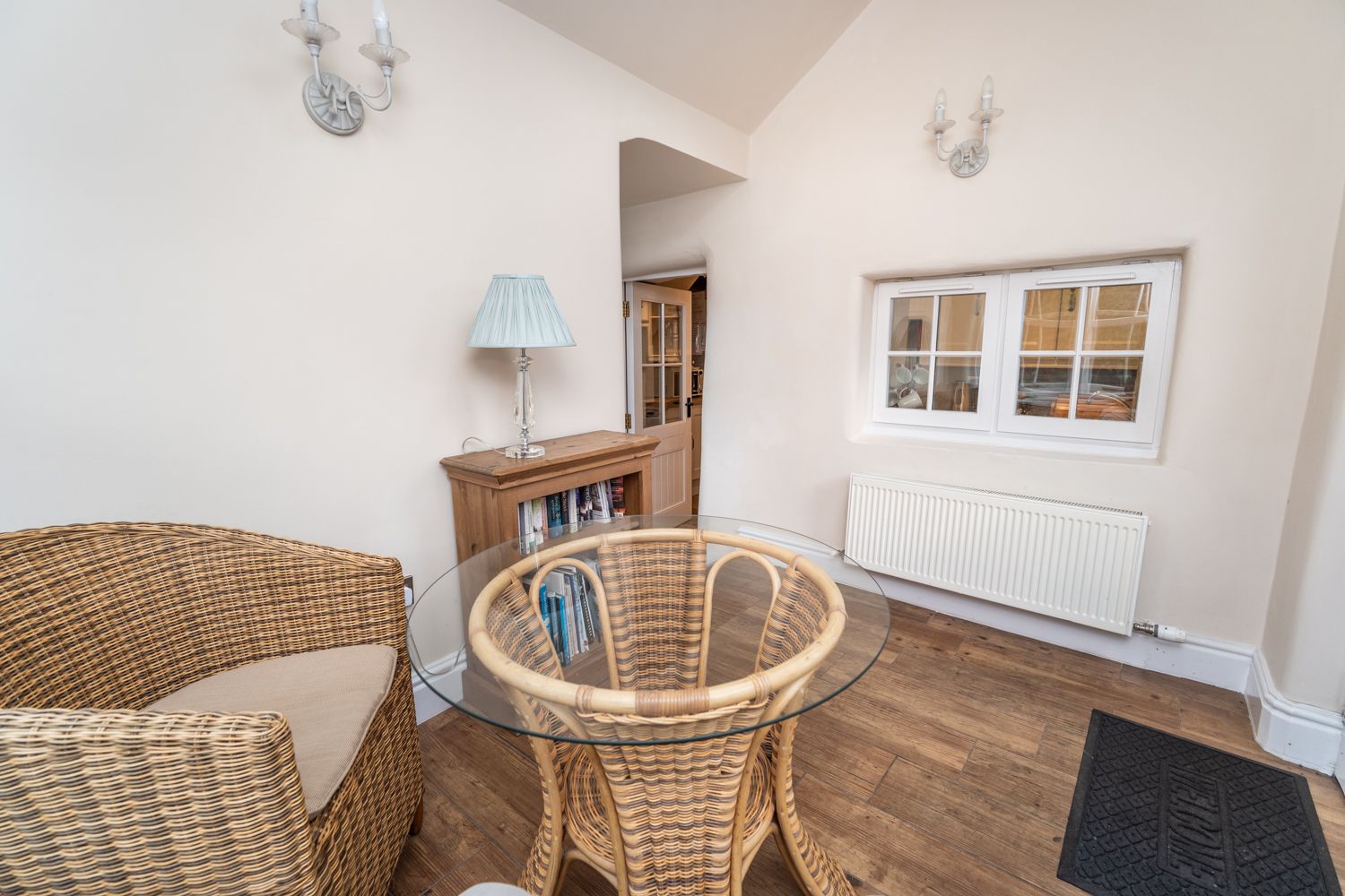 The internal window looks through to the kitchen area