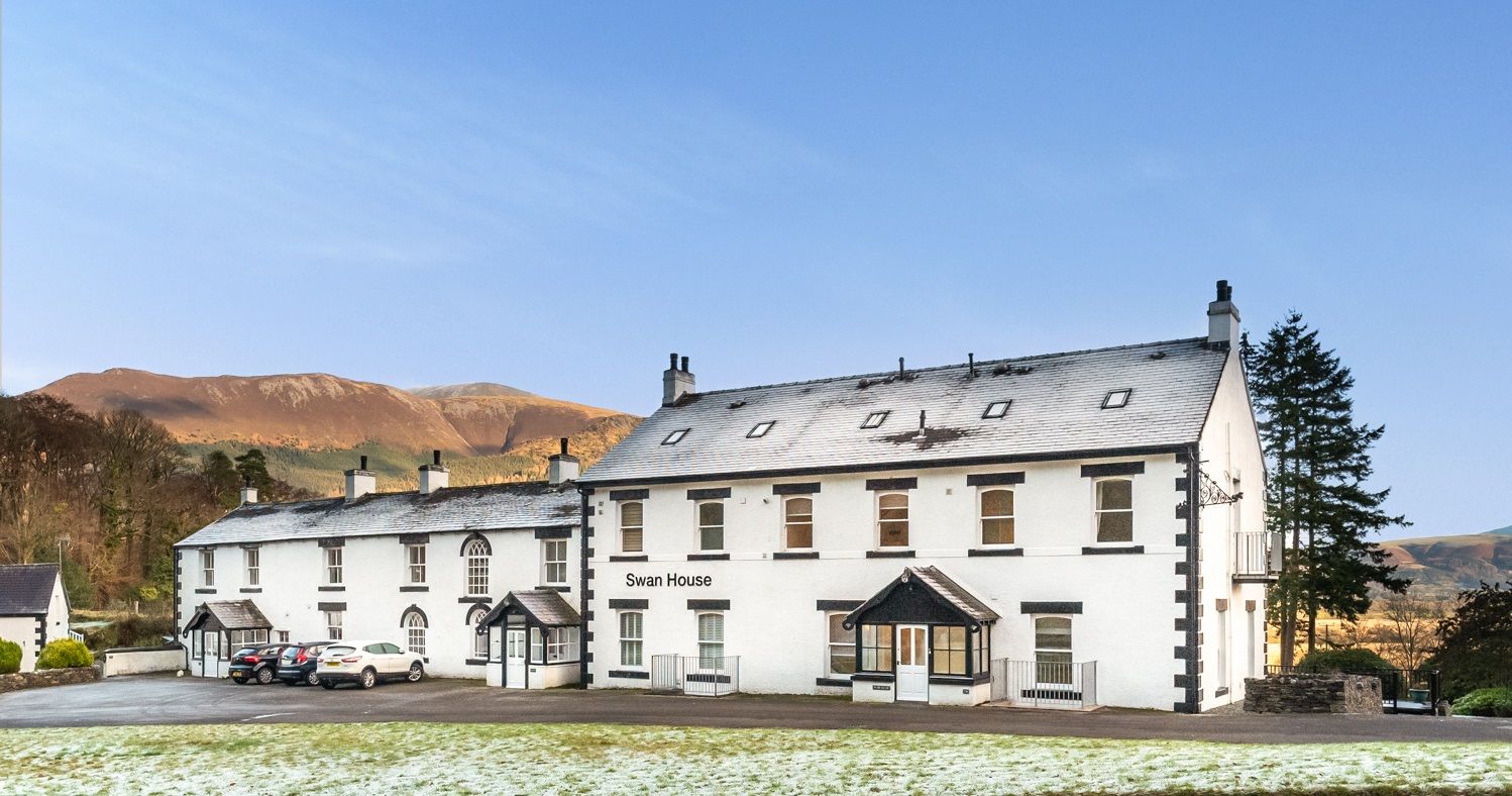 The front exterior of the property, with private parking available just outside