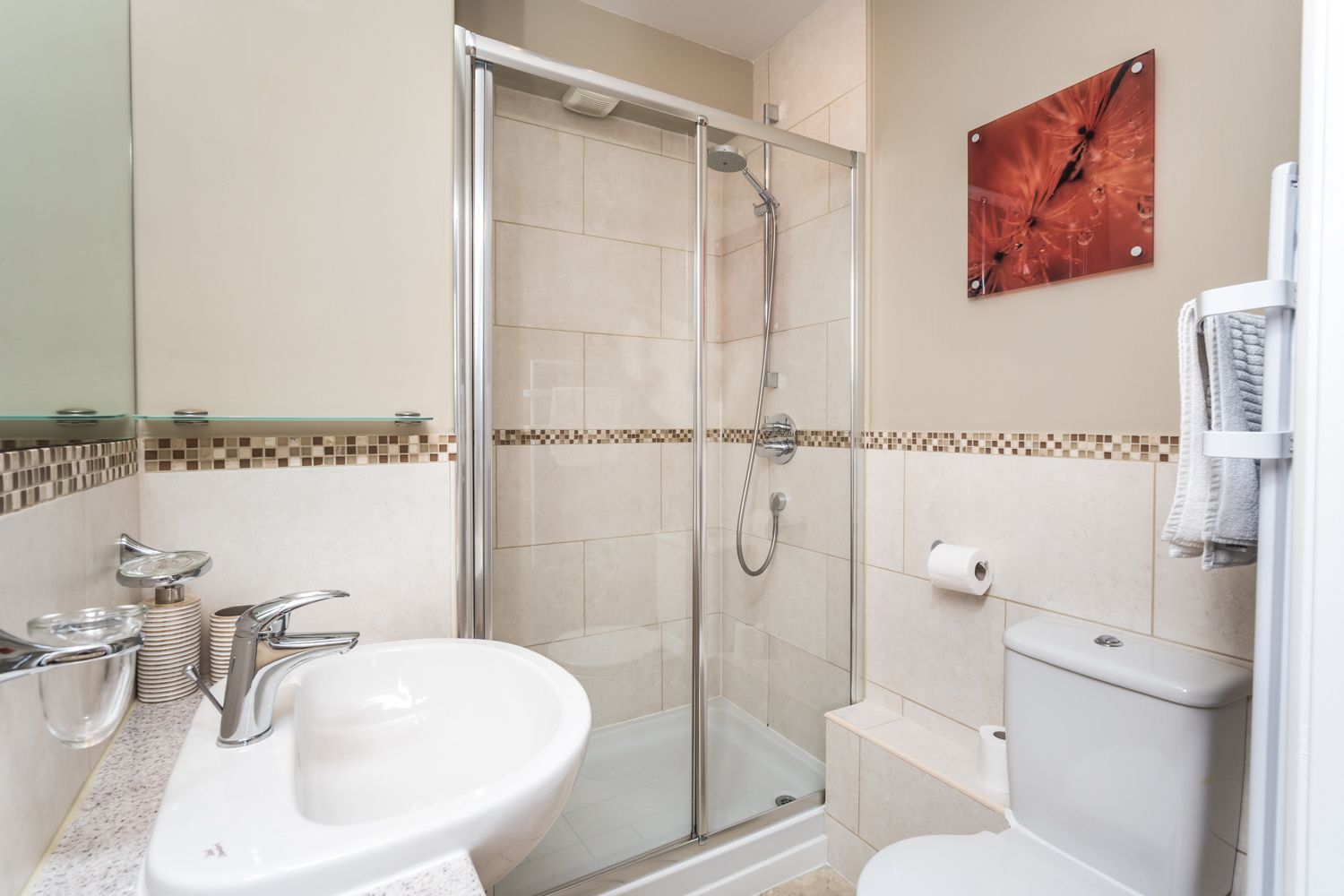 The ensuite shower room has walk in shower, hand basin and WC
