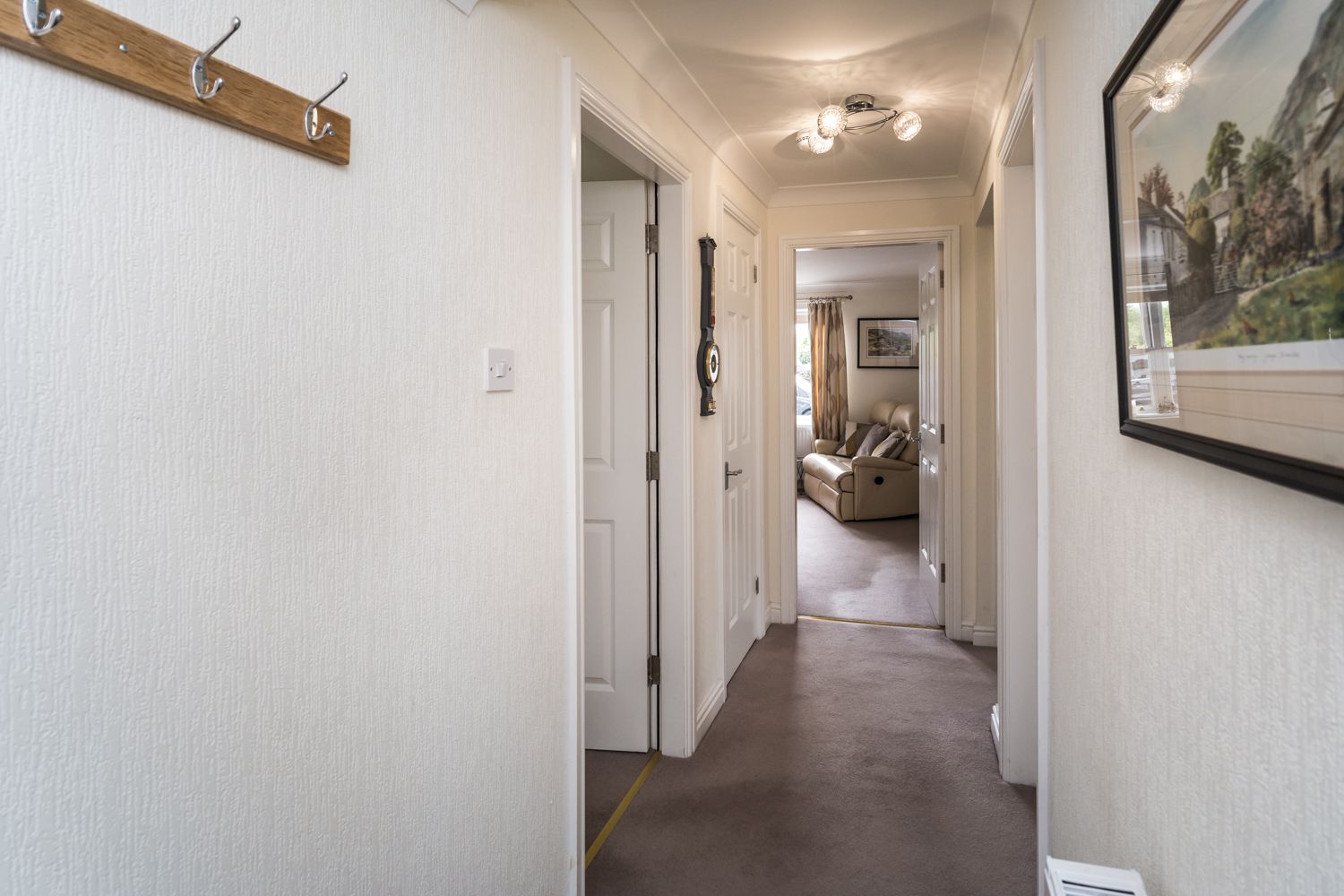 The front door leads into the entrance hall, with room for muddy boots and coats