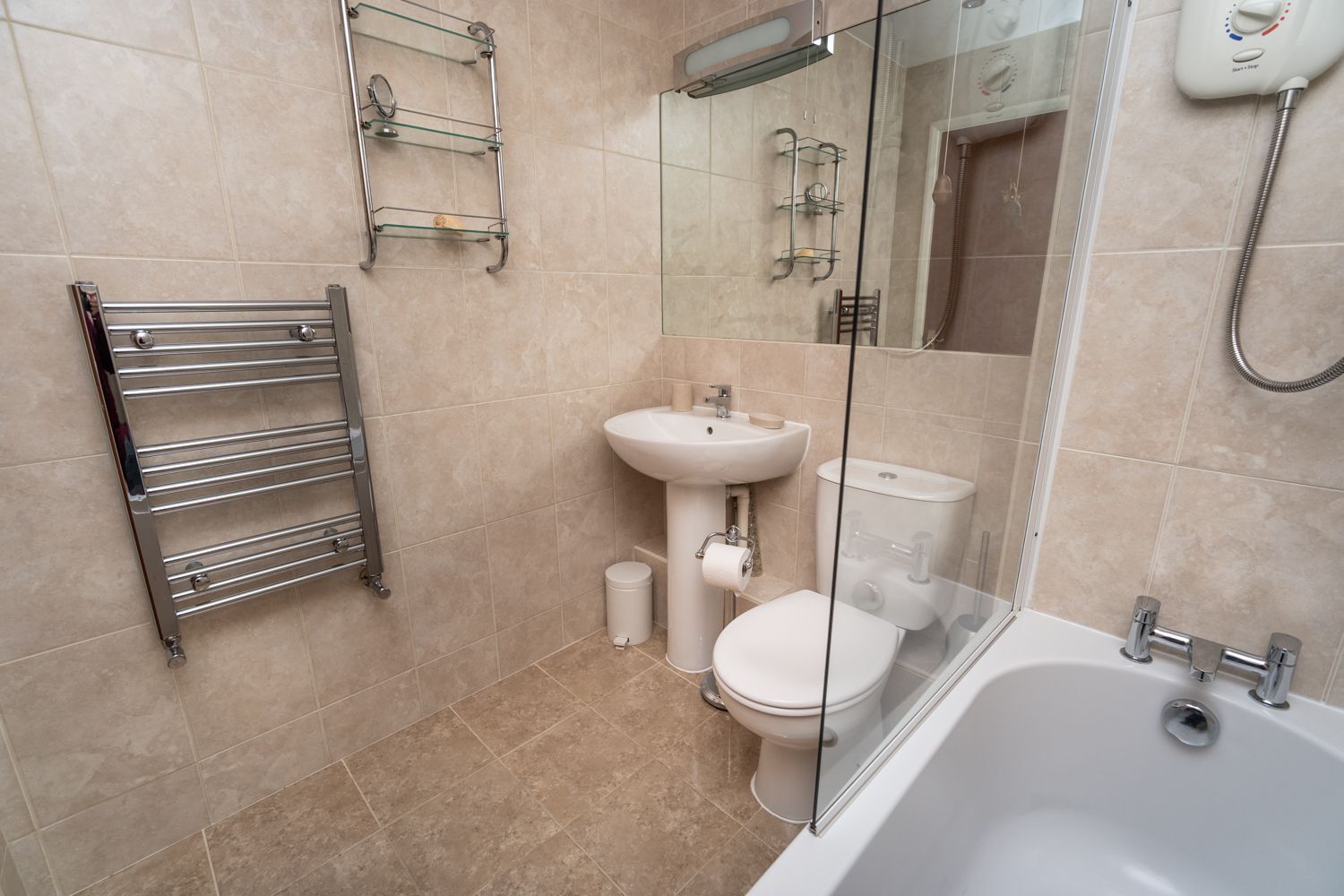 There is a heated towel rail, towels and hand soap are provided