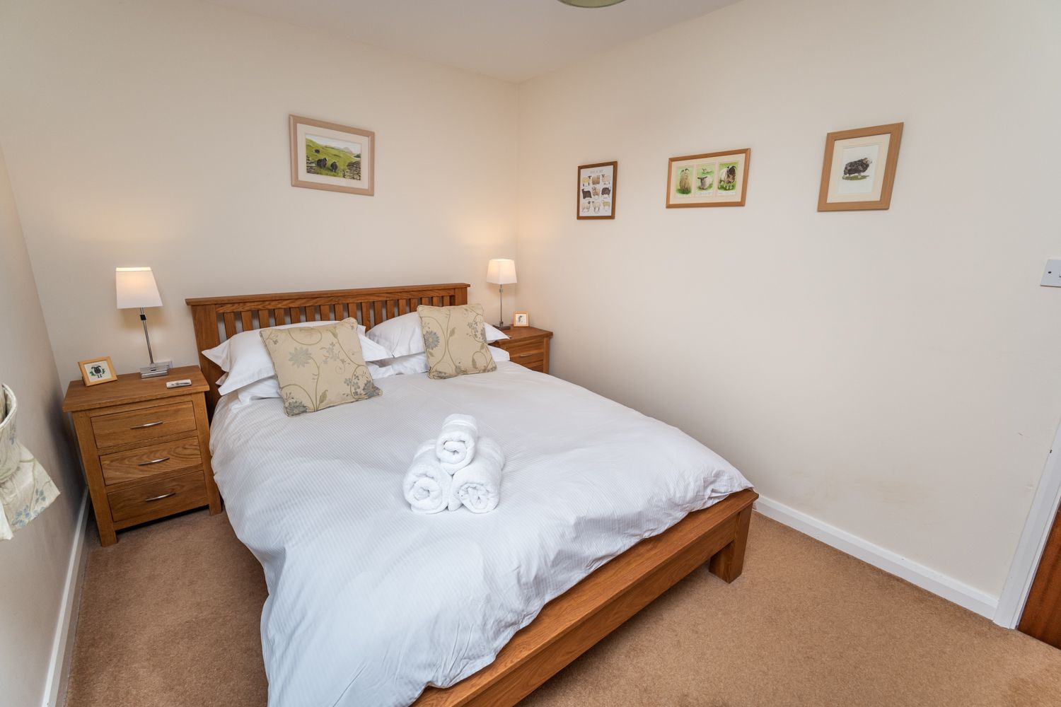 The room is also furnished with wardrobe, chest of drawers and bedside tables