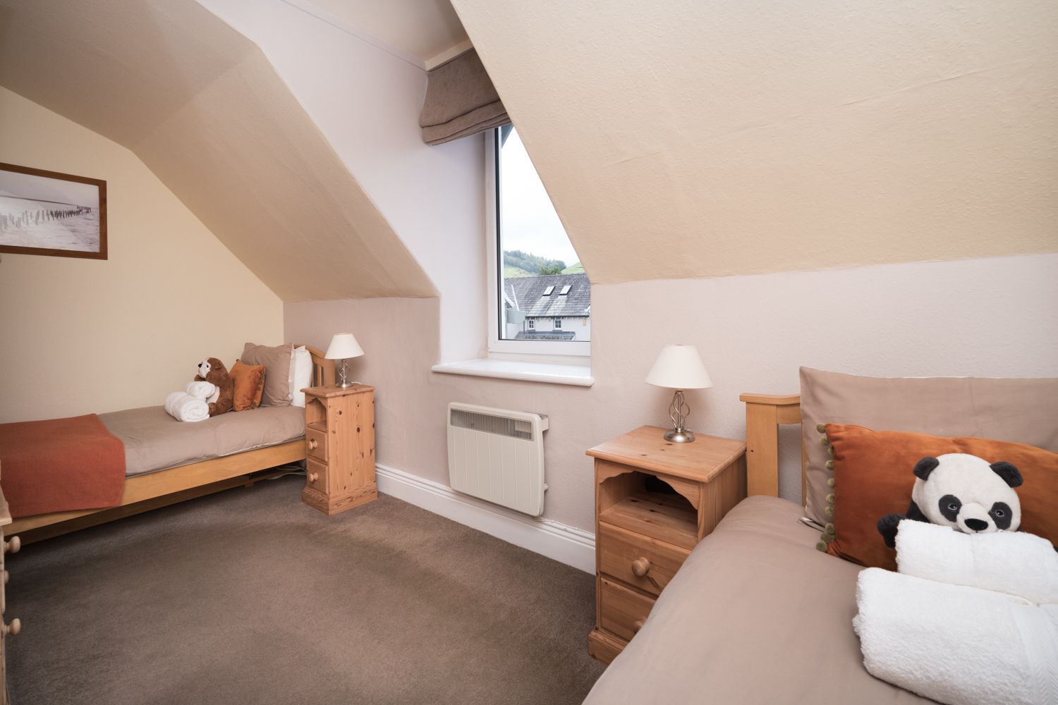 The second bedroom is a twin and features 2 single beds