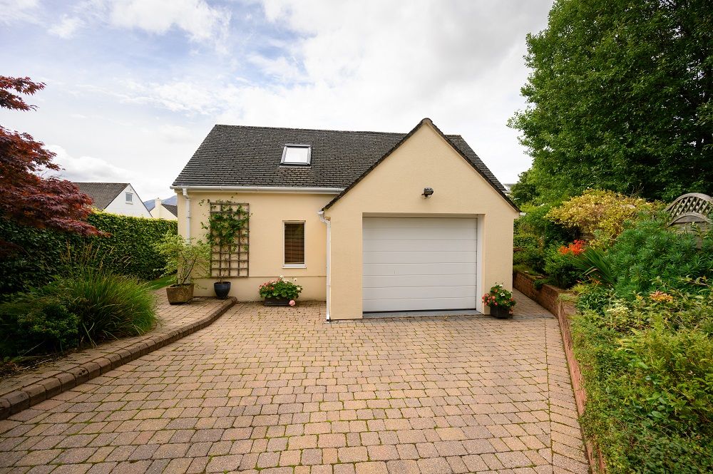 There is a private driveway to park your car and a garage area to store bikes, paddleboards or kayaks