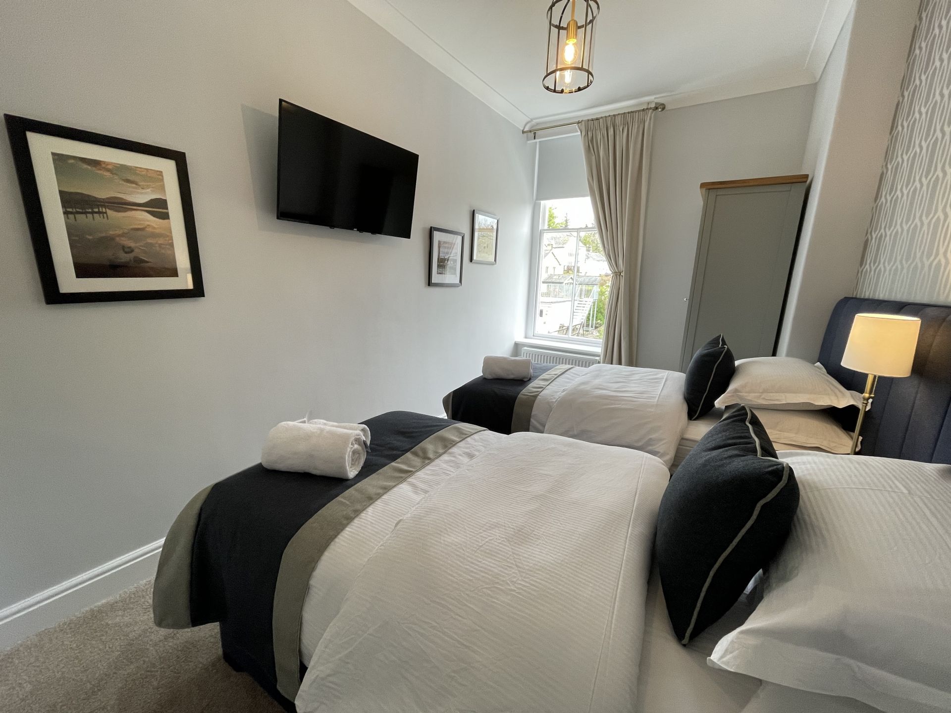 All bedrooms boast wall mounted TV's