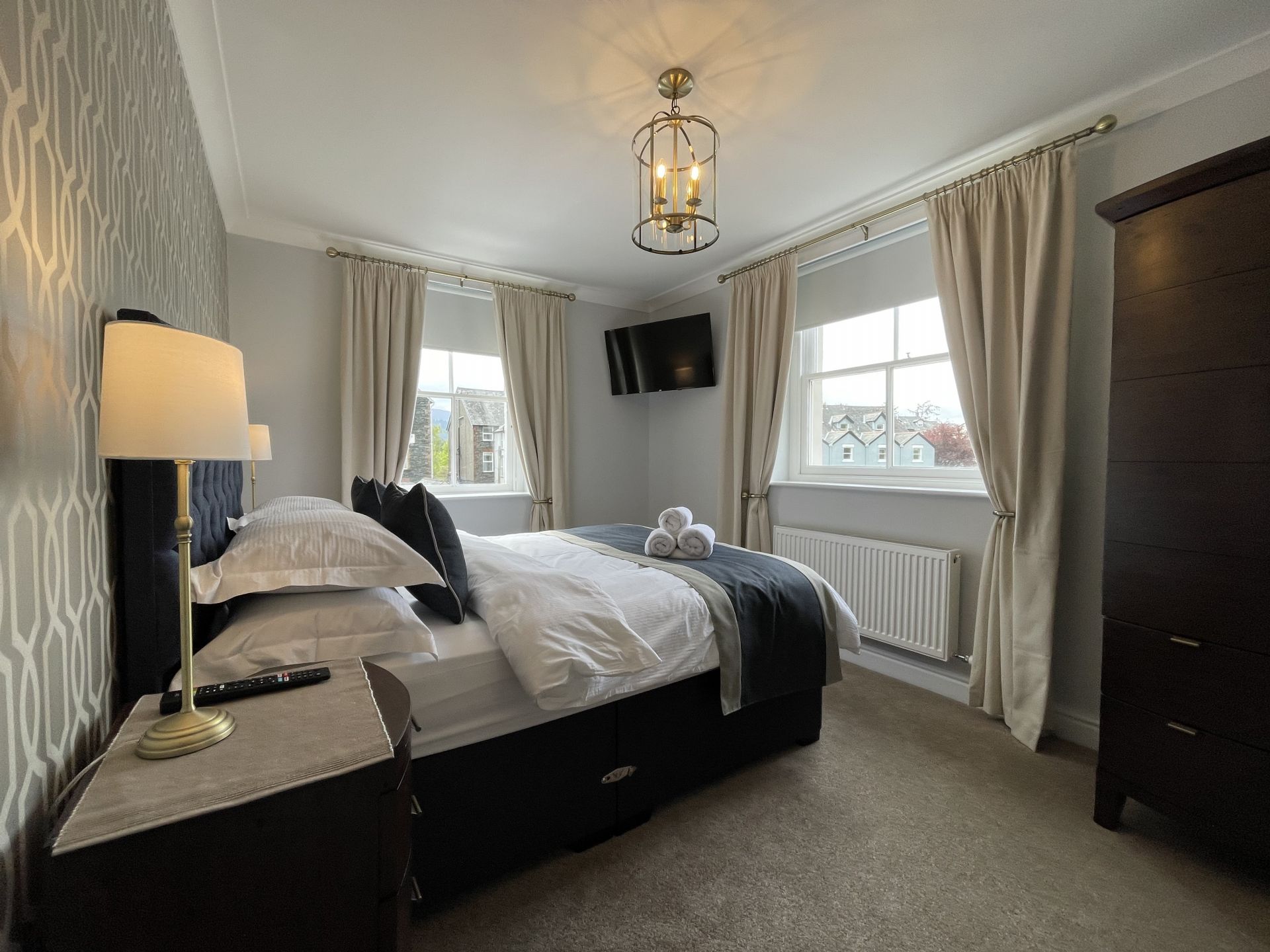 Enjoy a film from the comfort of your bed