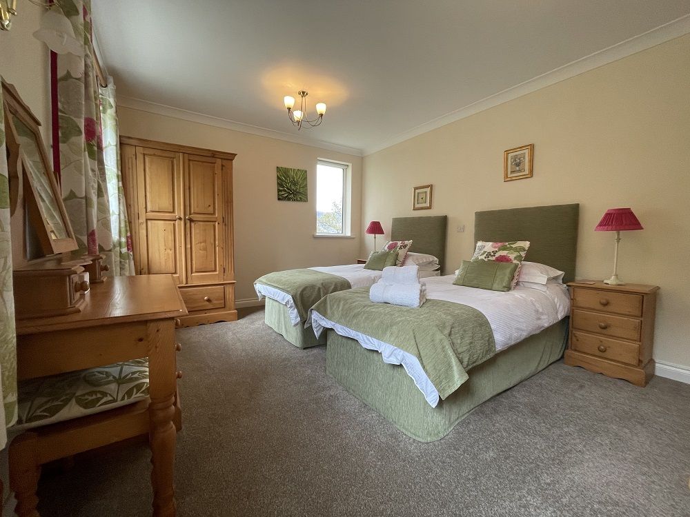This spacious room contains 2 single beds, which can be made up as a super-king for an extra fee