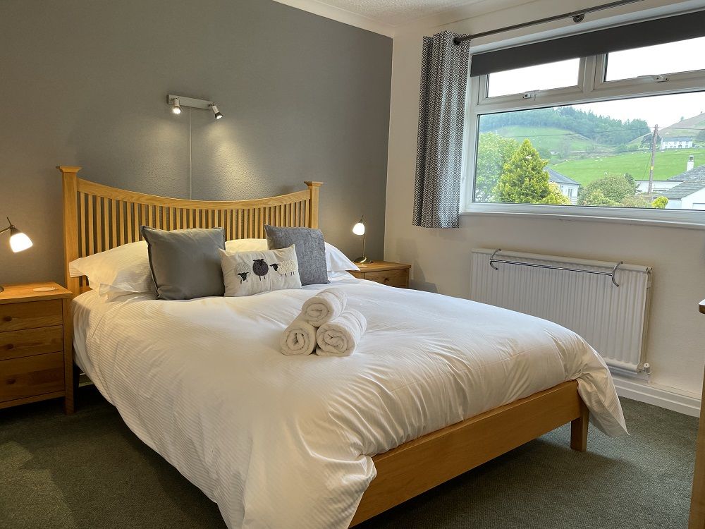 You can enjoy beautiful views of the surrounding area from the master bedroom