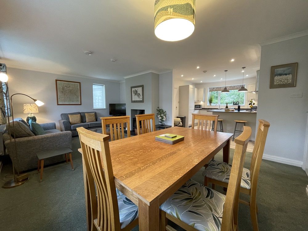 The large dining table will accommodate the whole family 