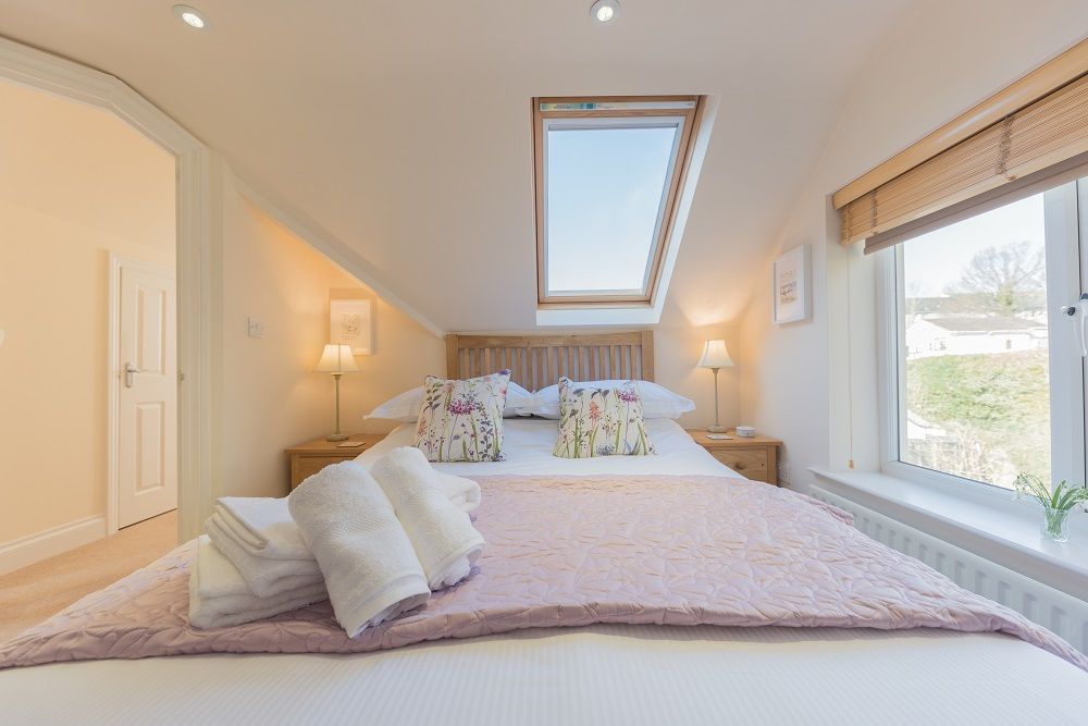 Both upstairs bedrooms have built in closets to store luggage