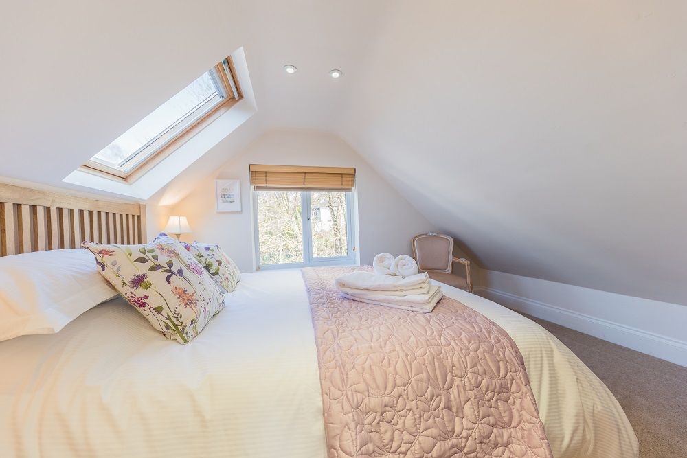 The upstairs bedrooms have delightful garden views