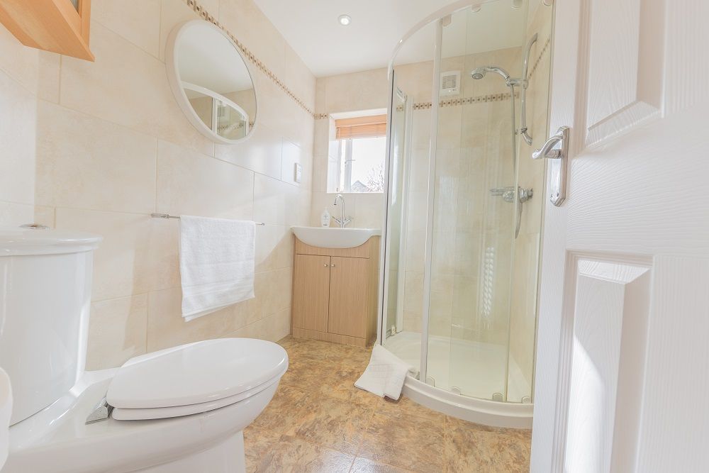 You will find a walk in shower, hand sink and WC in the ensuite bathroom