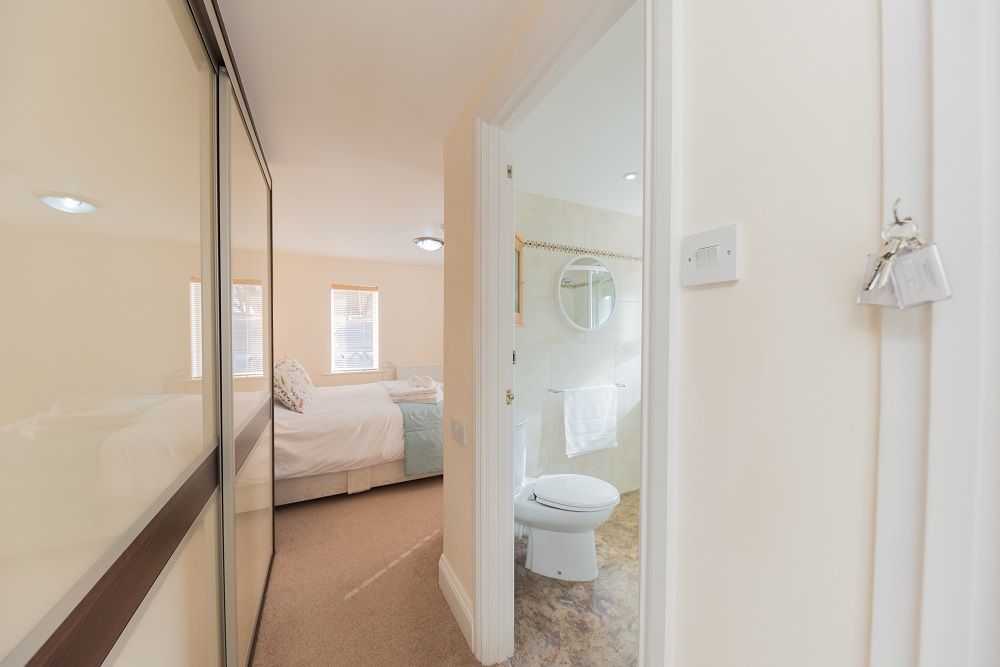 There are large fitted wardrobes and an ensuite shower room