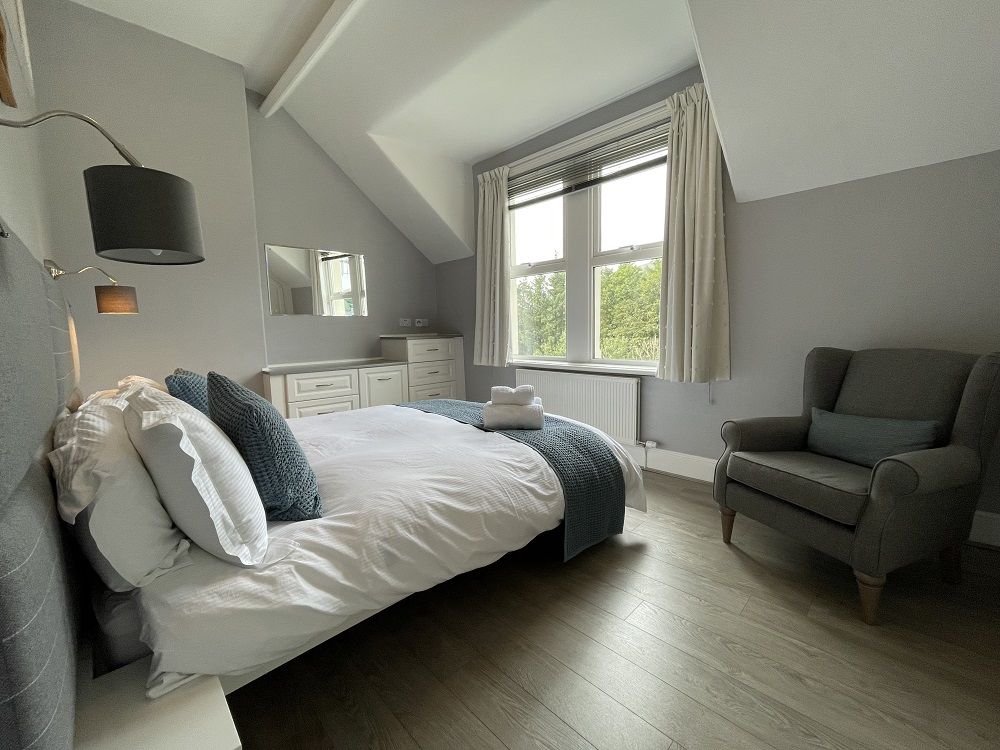 The front bedroom features a king sized bed