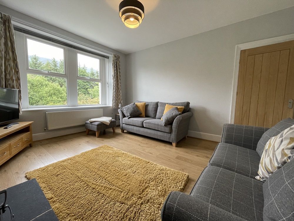 Enjoy the log burning stove after a day out in the fells