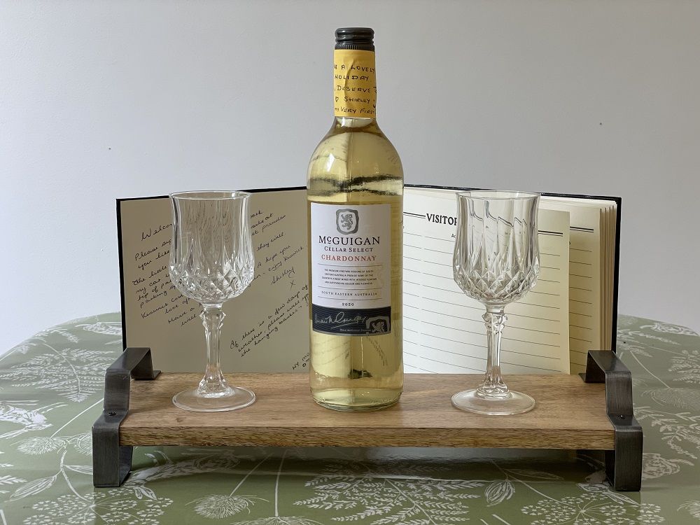 Enjoy a glass of wine at the dining table or in the garden after a day adventuring