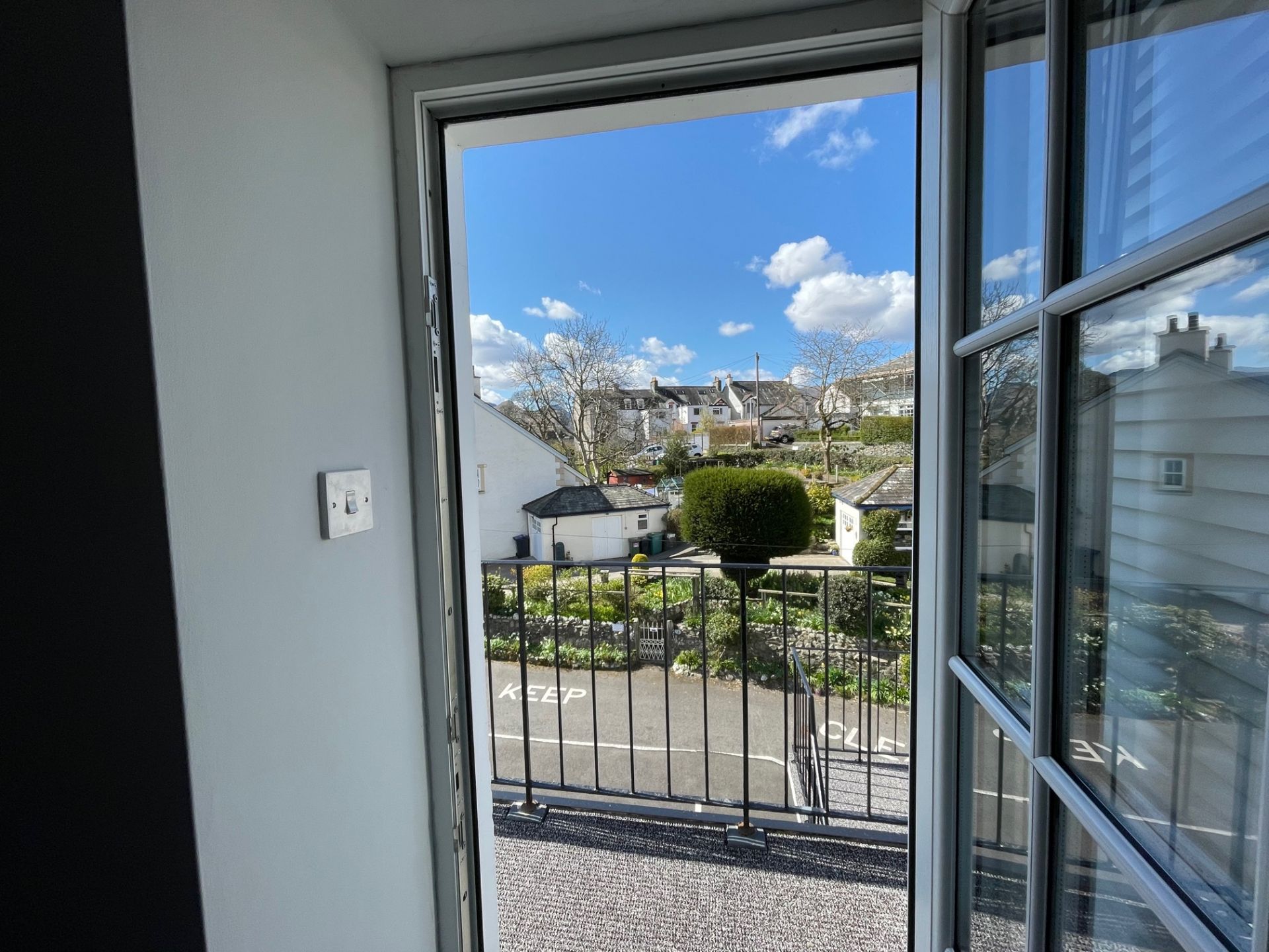 A beautiful sunny outlook from the front, southwest facing entrance